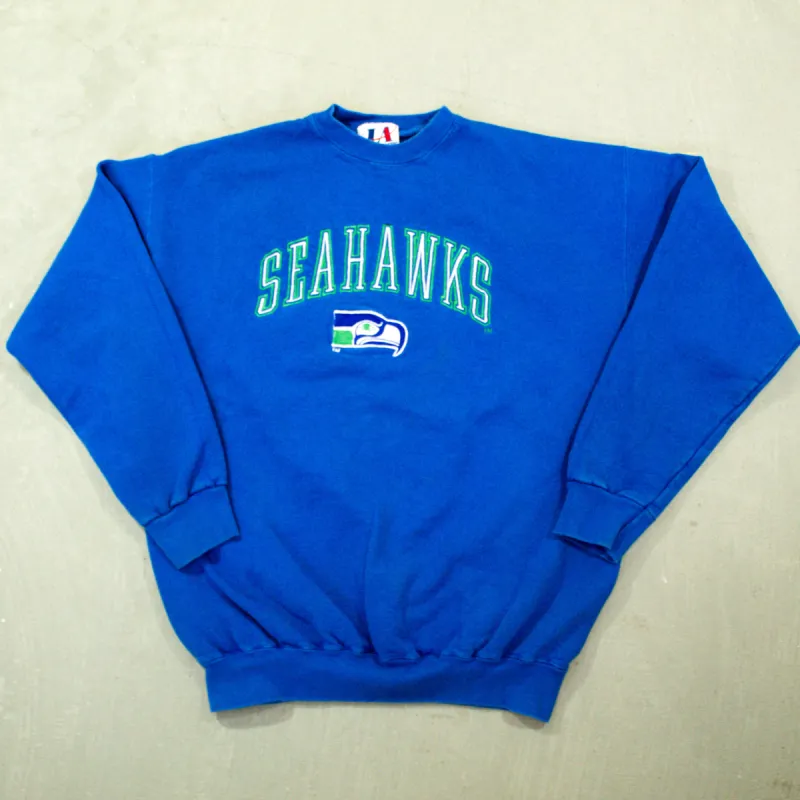 D- Vintage Seattle Seahawk NFL Logo Athletic Embroidered Logo Crewneck sold by HG Vintage