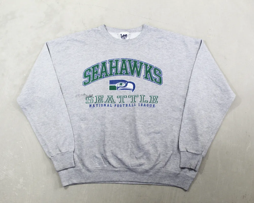 D- Vintage 1997 Seattle Seahawk NFL Lee Logo & Text Crewneck sold by HG Vintage