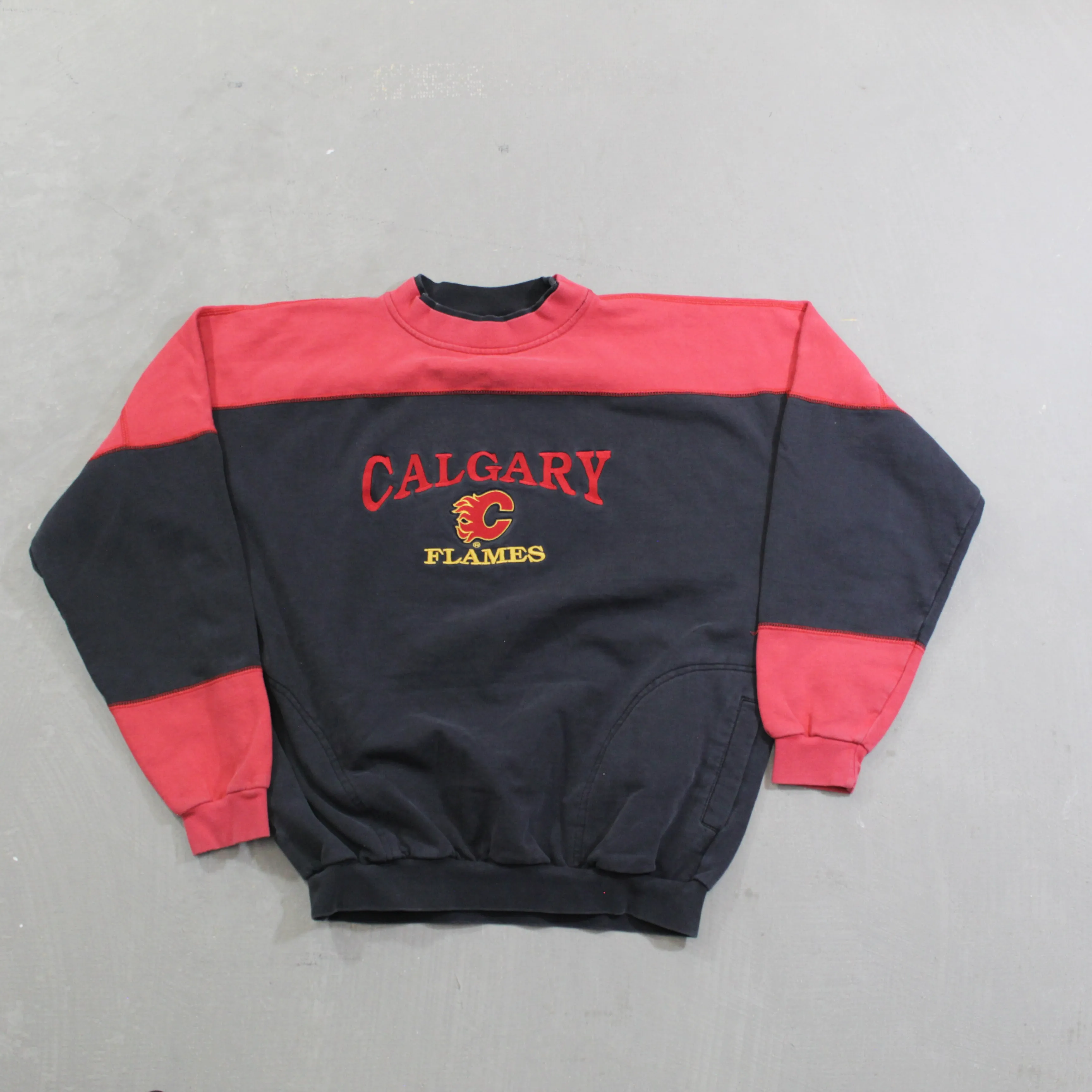D- Vintage Calgary Flames NHL Embroidered Logo Crewneck sold by HG Vintage