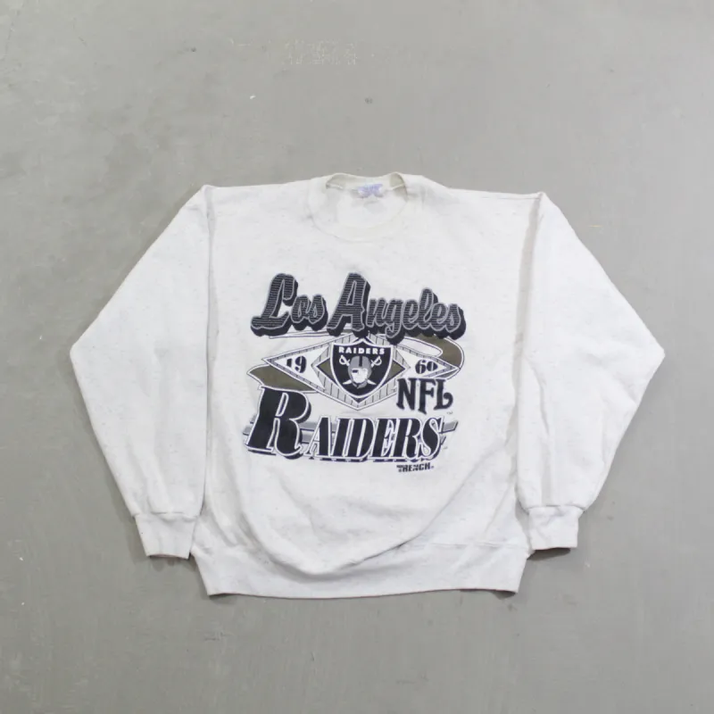 D- Vintage Los Angeles Raiders NFL Trench Text & Logo Crewneck sold by HG Vintage