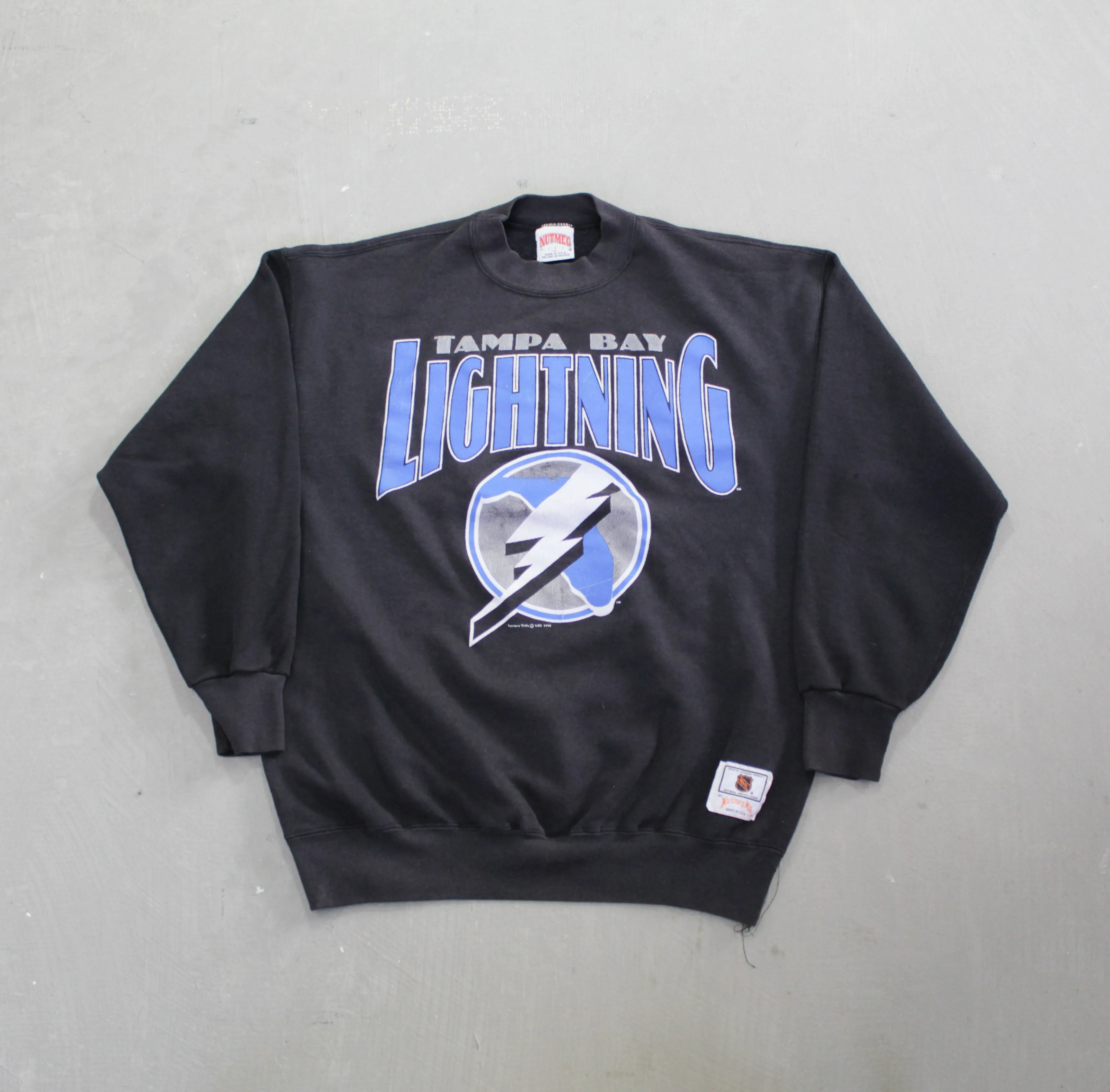 D- Vintage 1994 Tampa Bay Lightning NHL Nutmeg Crewneck sold by HG Vintage