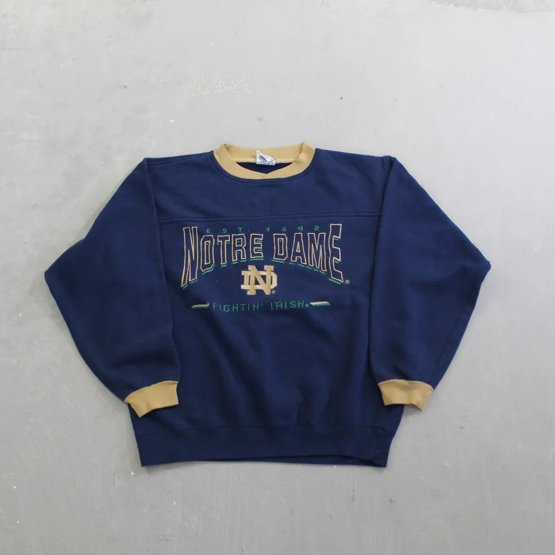 D- Vintage Notre Dame Fighting Irish Nutmeg Embroidered Script Crewneck sold by HG Vintage