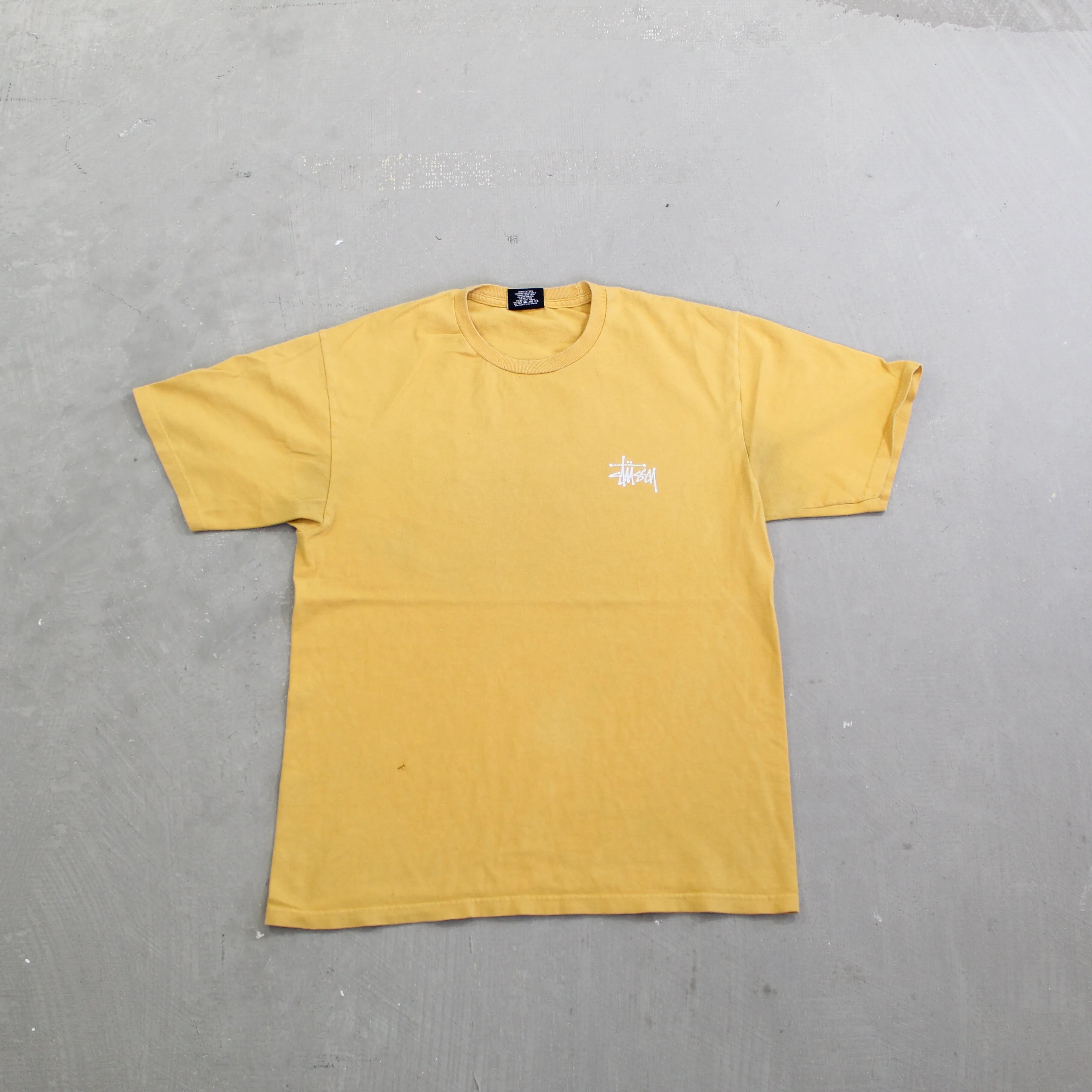 D- Stussy Cursive Script Tee sold by HG Vintage