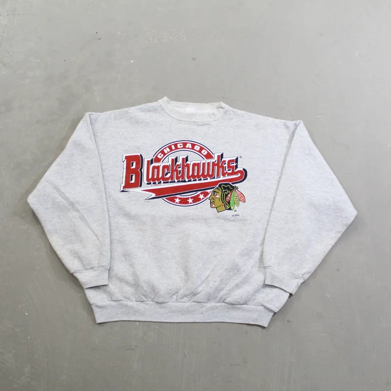 D- Vintage Chicago Blackhawks NHL Logo 7 text & Logo Crewneck sold by HG Vintage