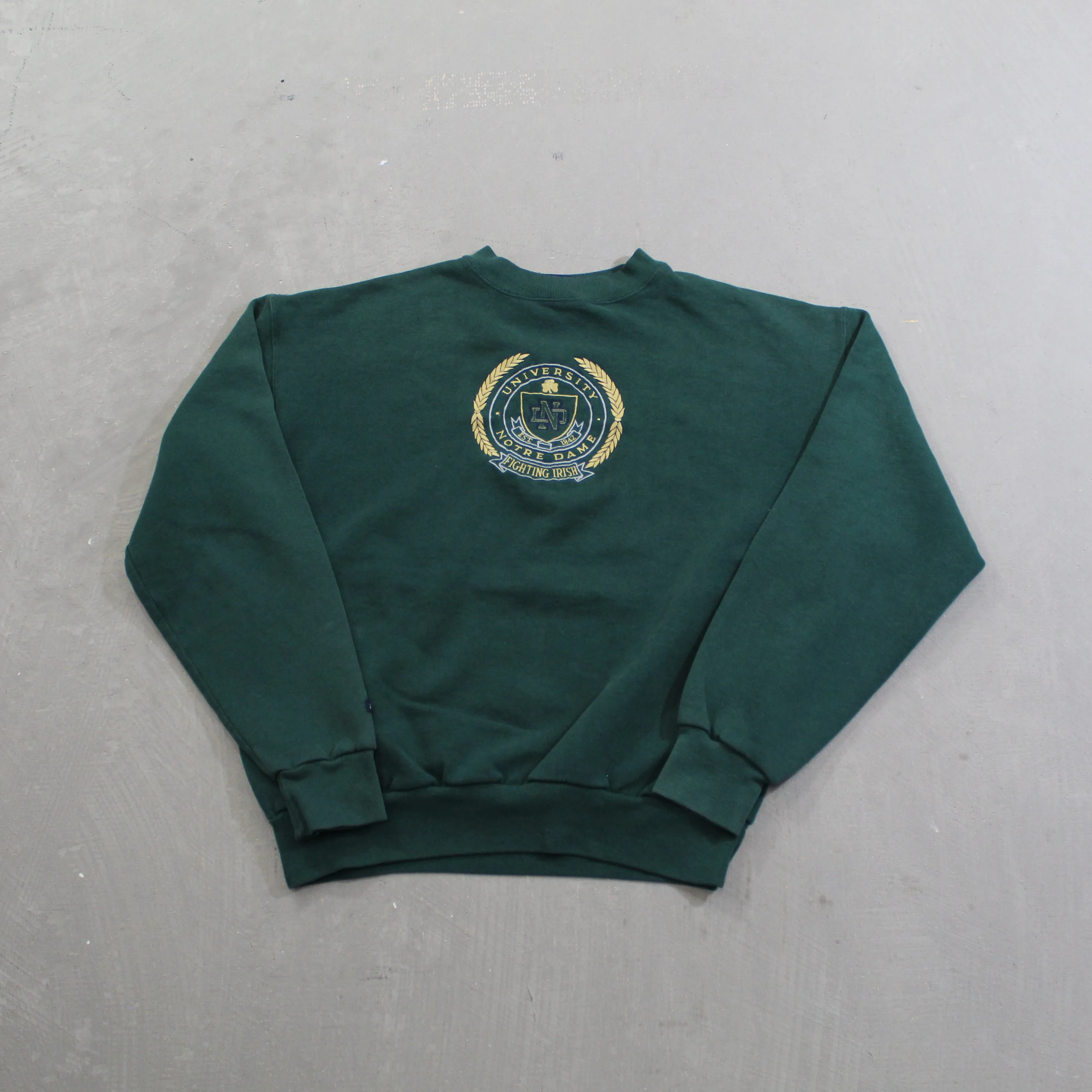 D- Vintage University Of Notre Dame Fighting Irish Embroidered Crest Crewneck sold by HG Vintage