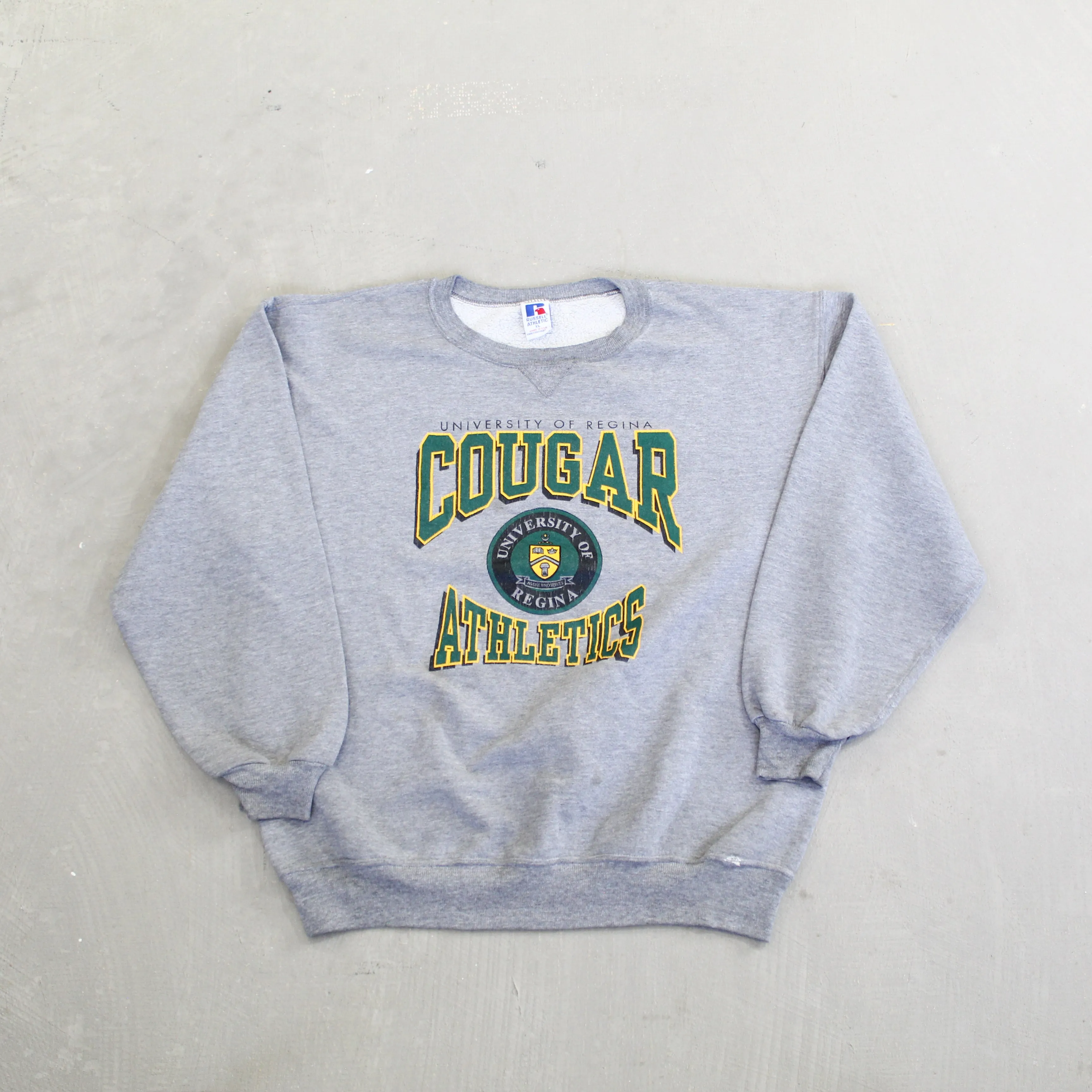 D- Vintage University Of Regina Cougars Russell Athletic Crewneck sold by HG Vintage