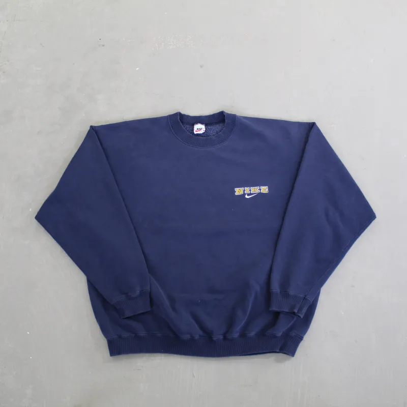 D- Vintage 90s Nike Chest Embroidered Text & Swoosh Crewneck sold by HG Vintage