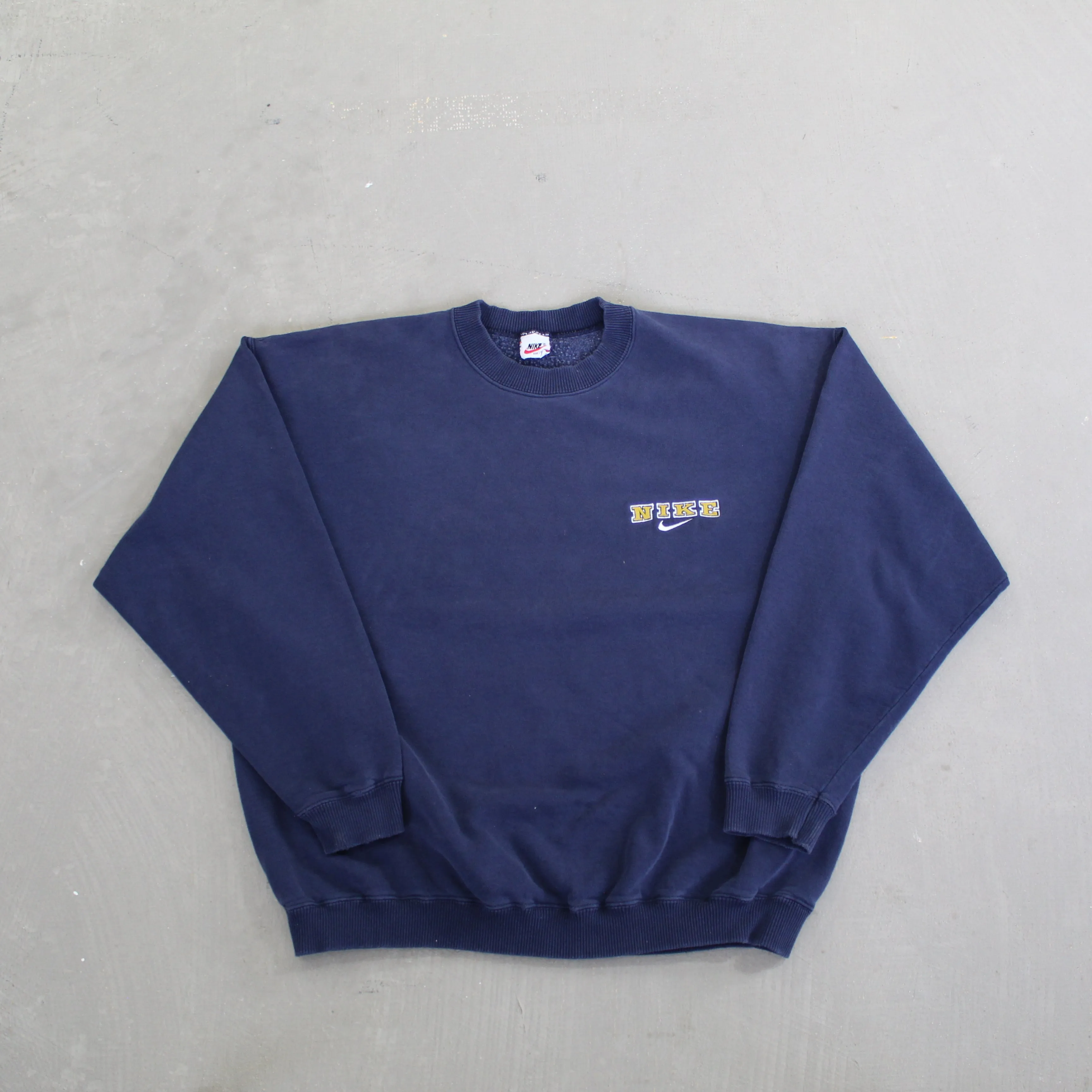 D- Vintage 90s Nike Chest Embroidered Text & Swoosh Crewneck sold by HG Vintage