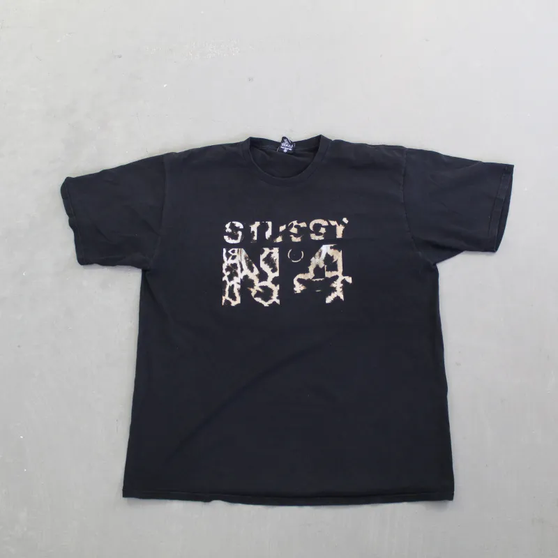 D- Vintage Stussy Number 4 Burnt Graphic Text Tee sold by HG Vintage