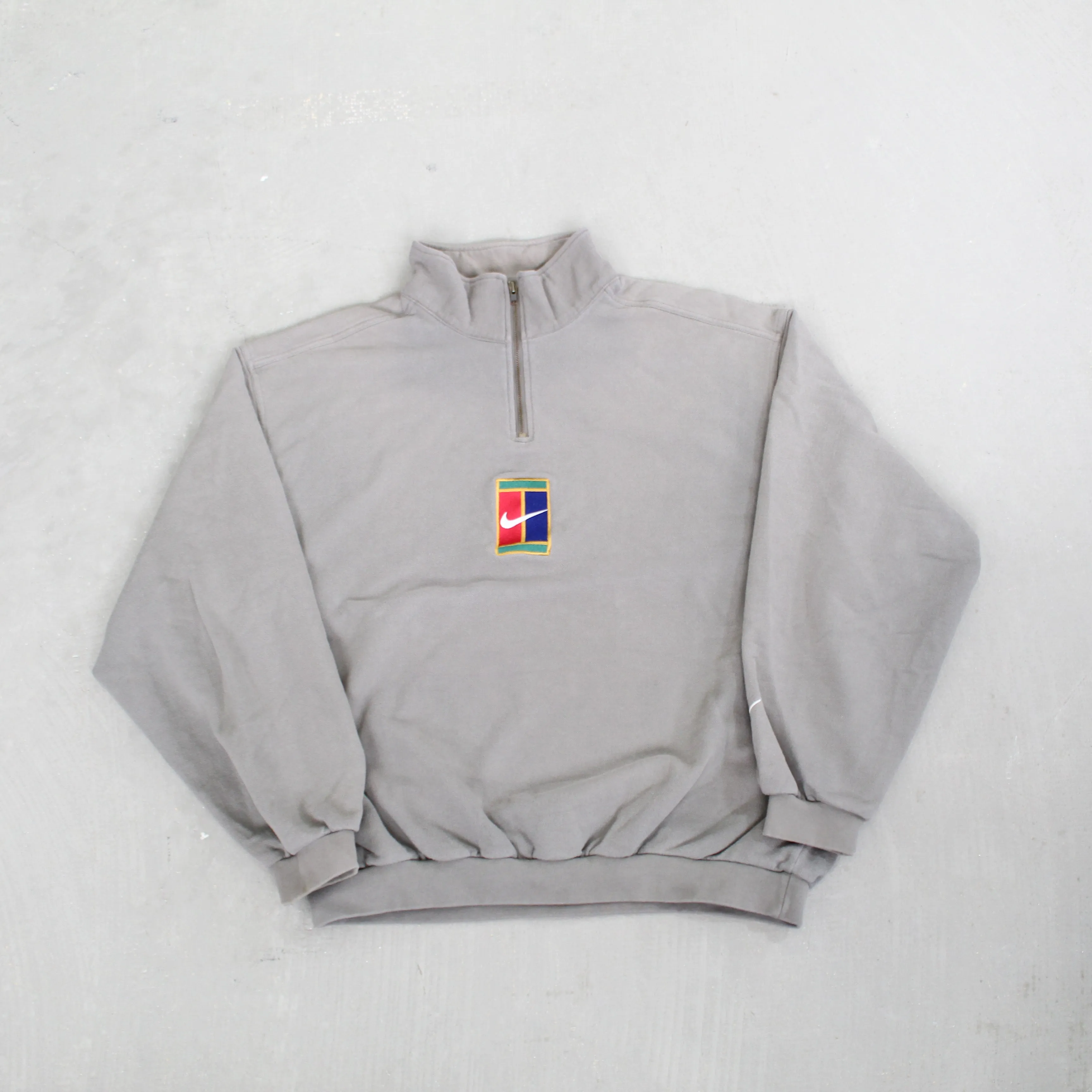 D- Vintage 90s Nike Tennis Embroidered Challenge Court Quarter Zip Crewneck sold by HG Vintage