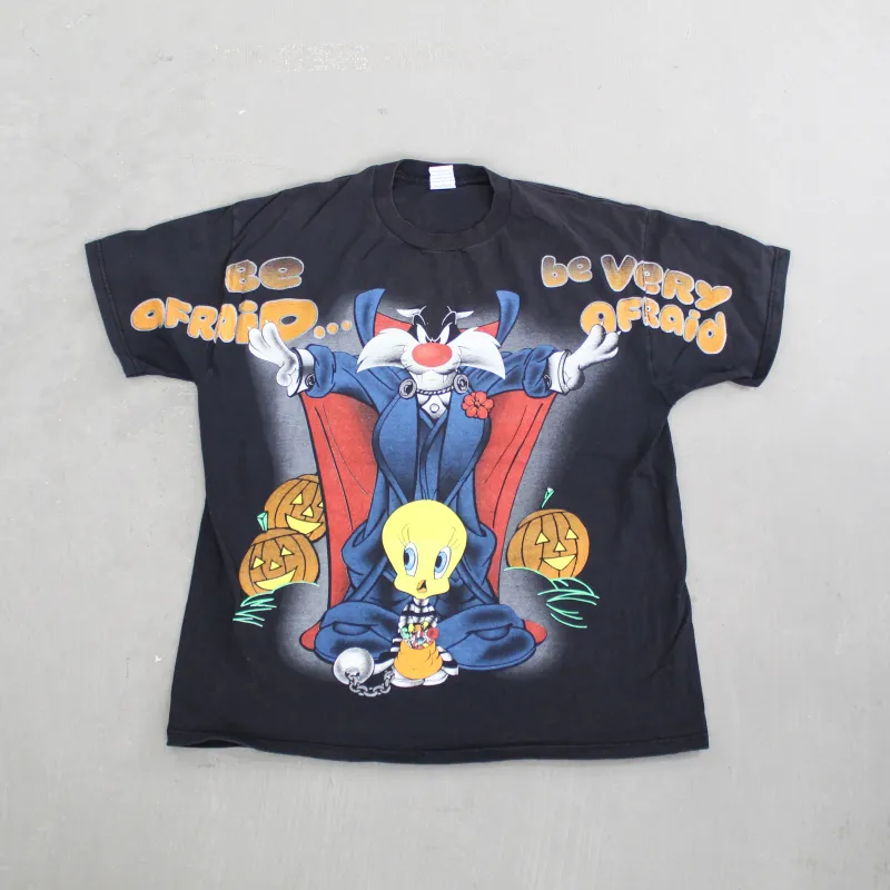 D- Vintage 1998 Looney Tunes Silvester Cat & Tweedy Bird Halloween Tee sold by HG Vintage