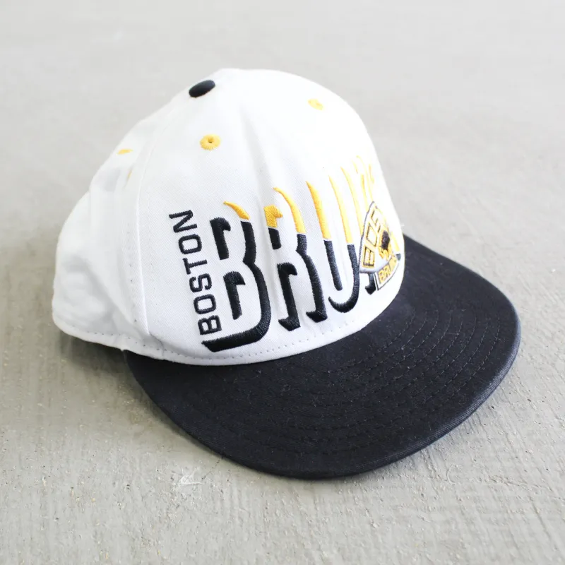 D- Vintage Boston Bruins NHL Text Snapback Hat sold by HG Vintage