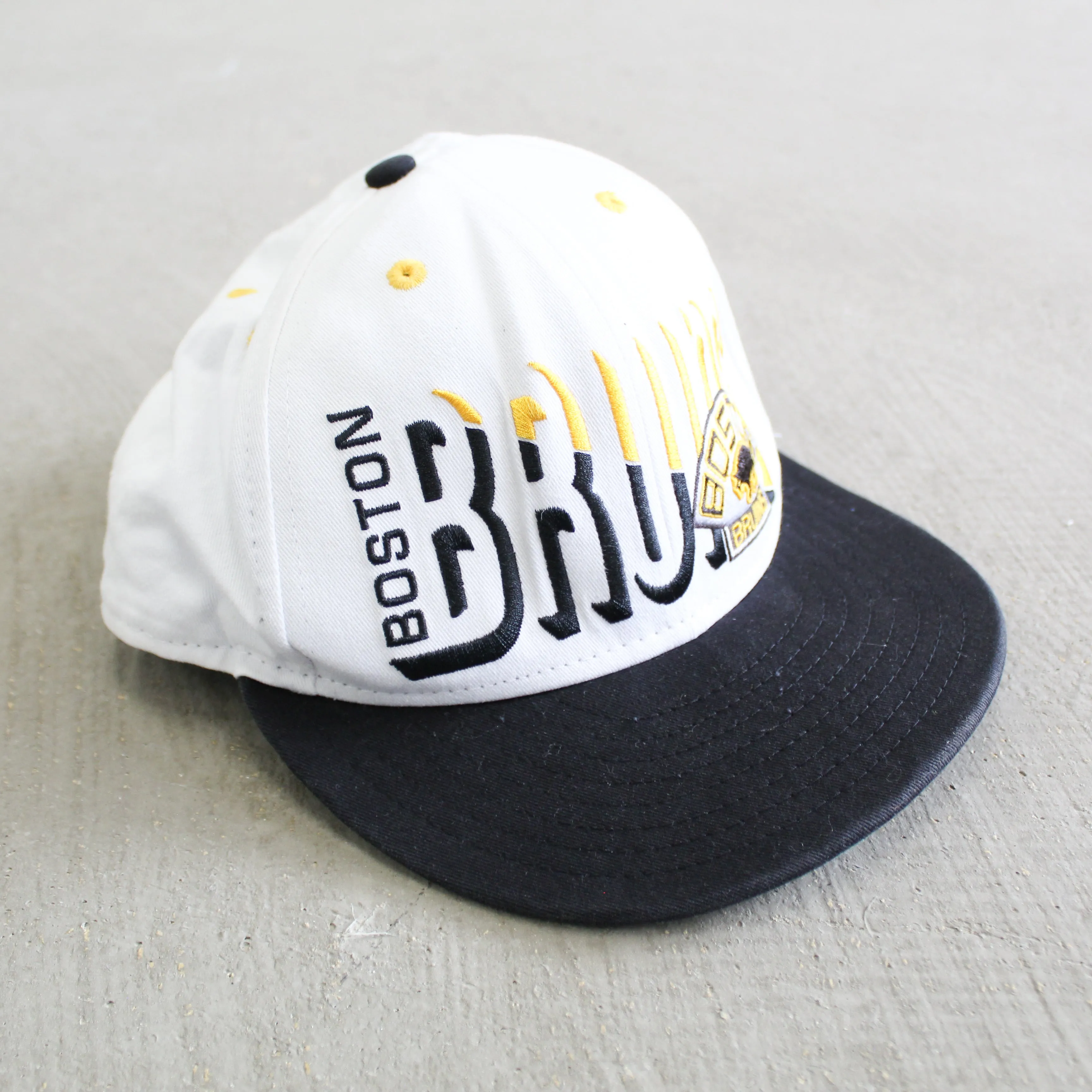 D- Vintage Boston Bruins NHL Text Snapback Hat sold by HG Vintage