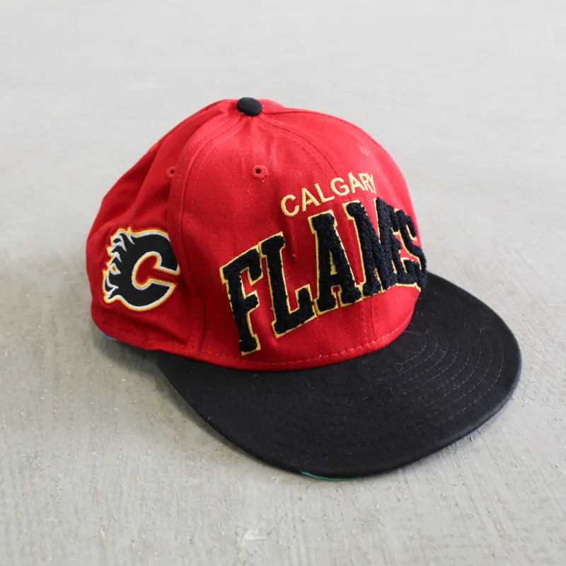 D- Vintage Calgary Flames NHL New Era Text Snapback Hat sold by HG Vintage