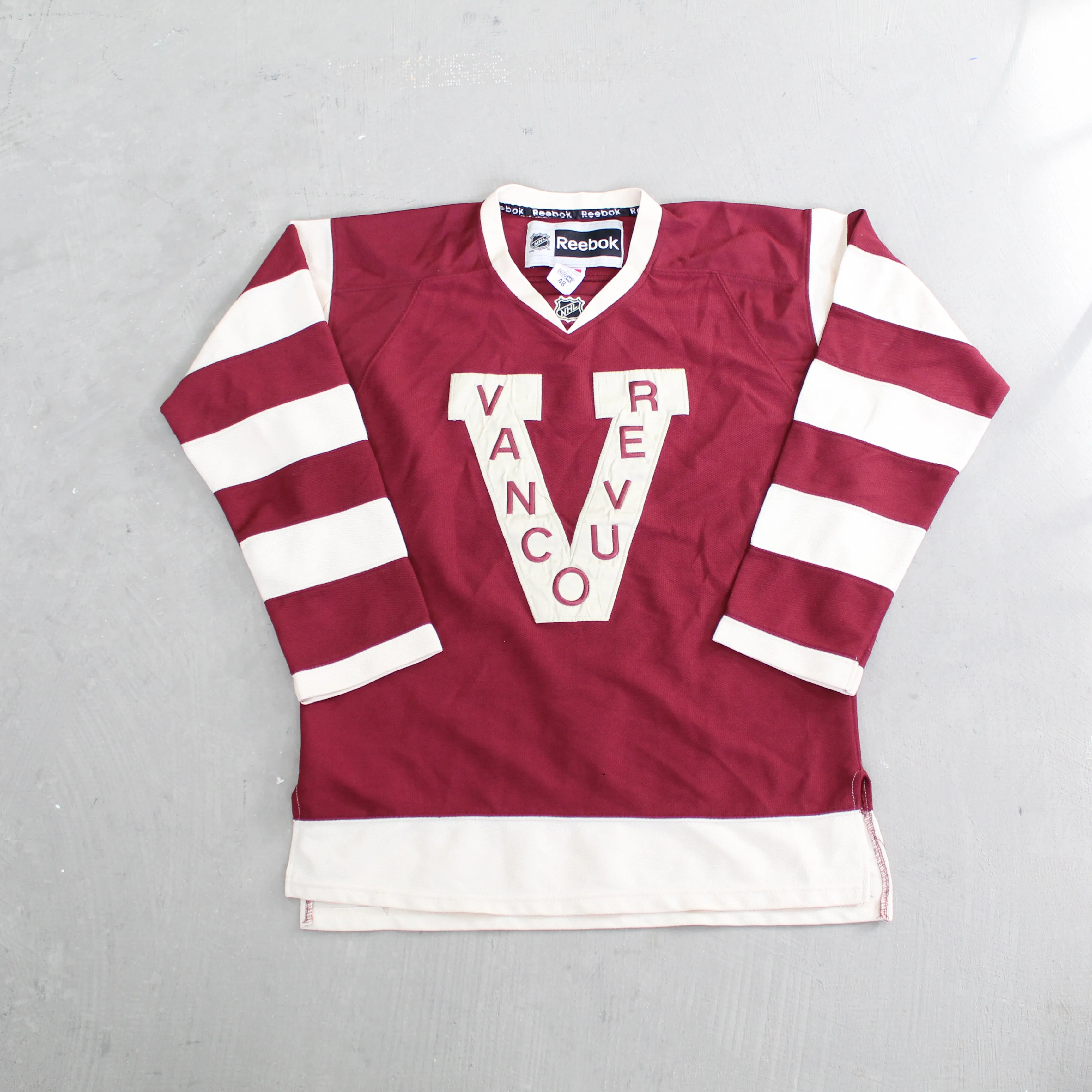 D- Vintage Vancouver Canucks NHL Reebok Embroidered Text Hockey Jersey sold by HG Vintage