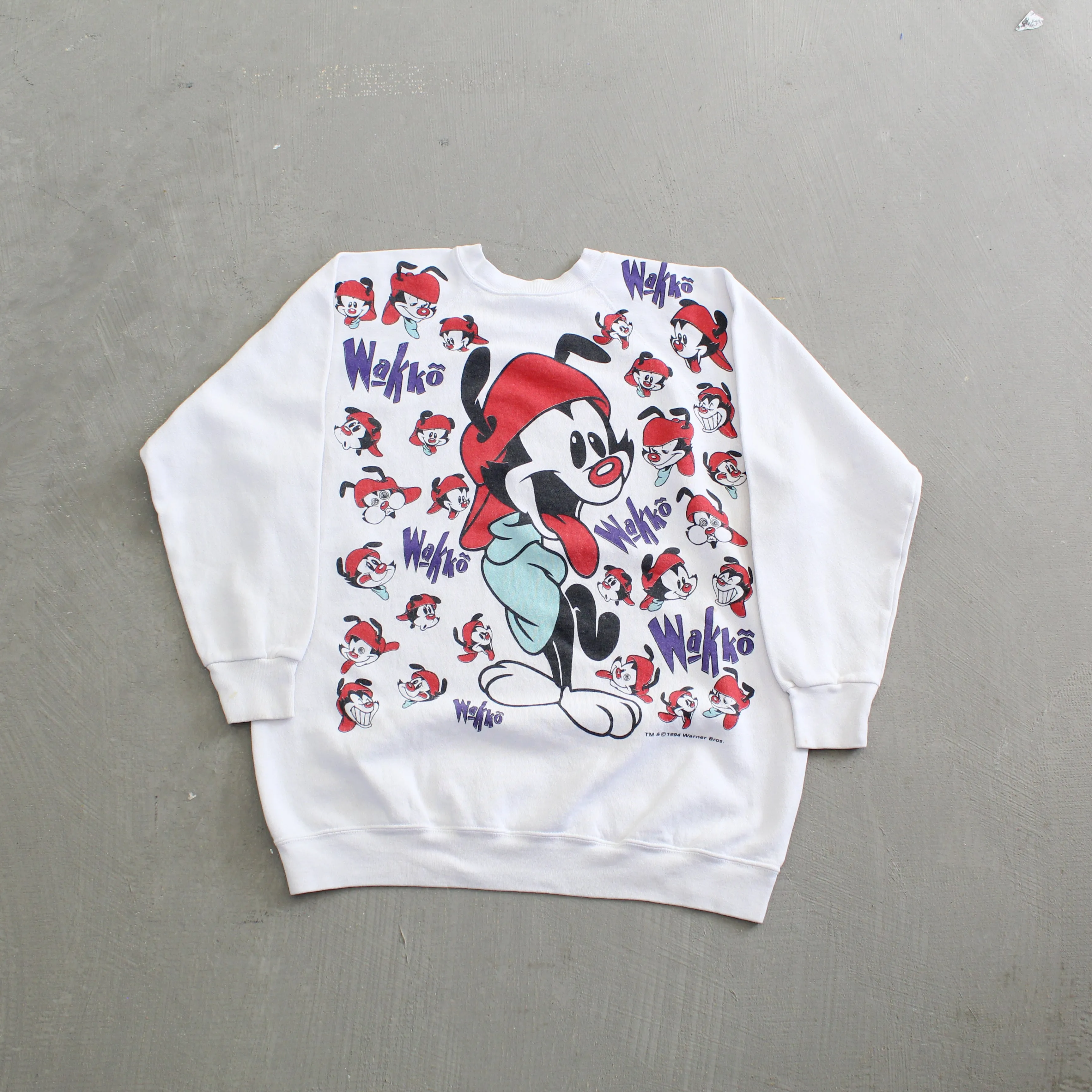D- Vintage 1994 Looney Tunes Wakko All Over Print Crewneck sold by HG Vintage