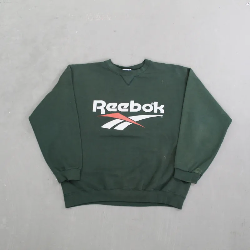 D- Vintage 90s Reebok Logo Graphic Crewneck sold by HG Vintage