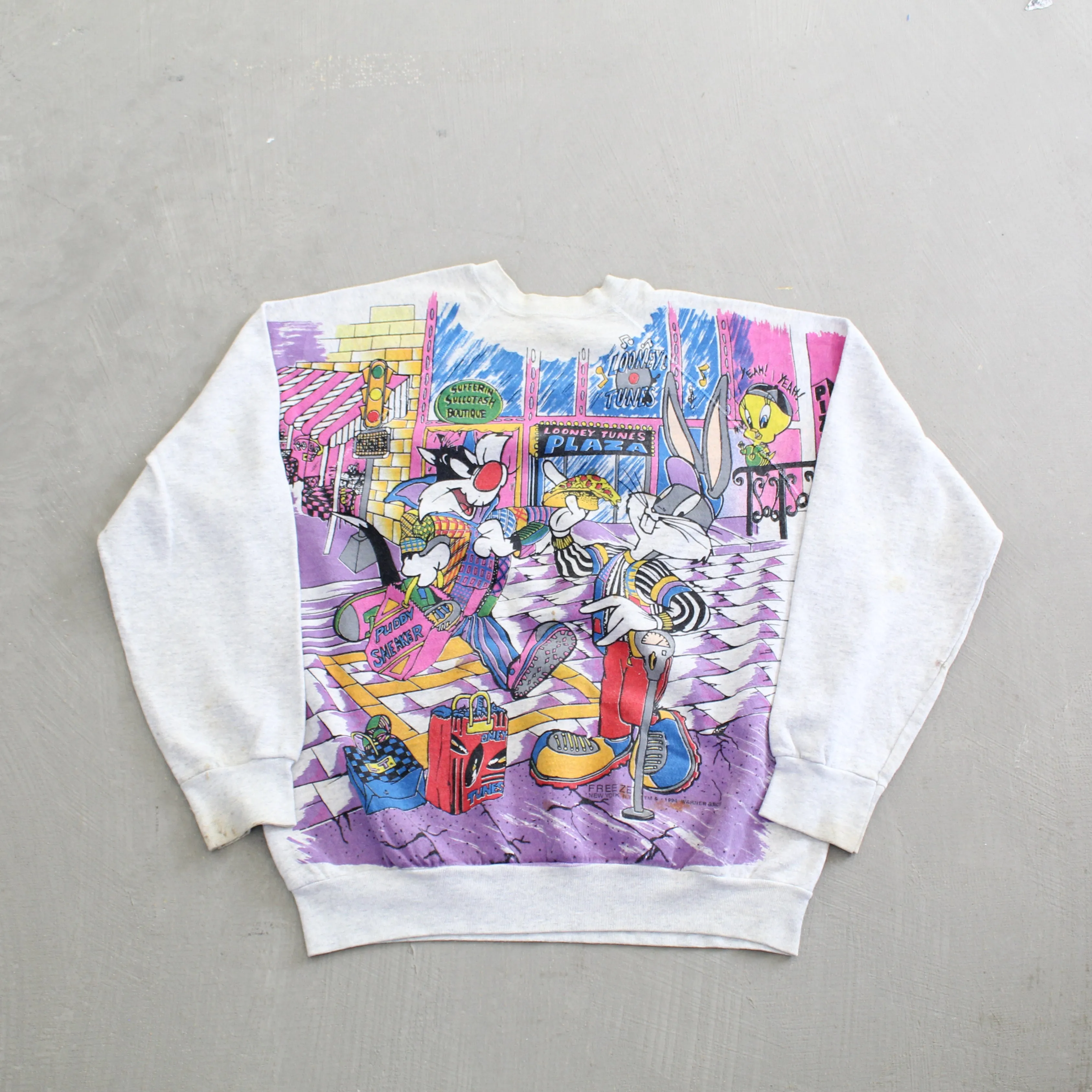F- Vintage 1994 Looney Tunes Plaza Jumbo Print Crewneck sold by HG Vintage