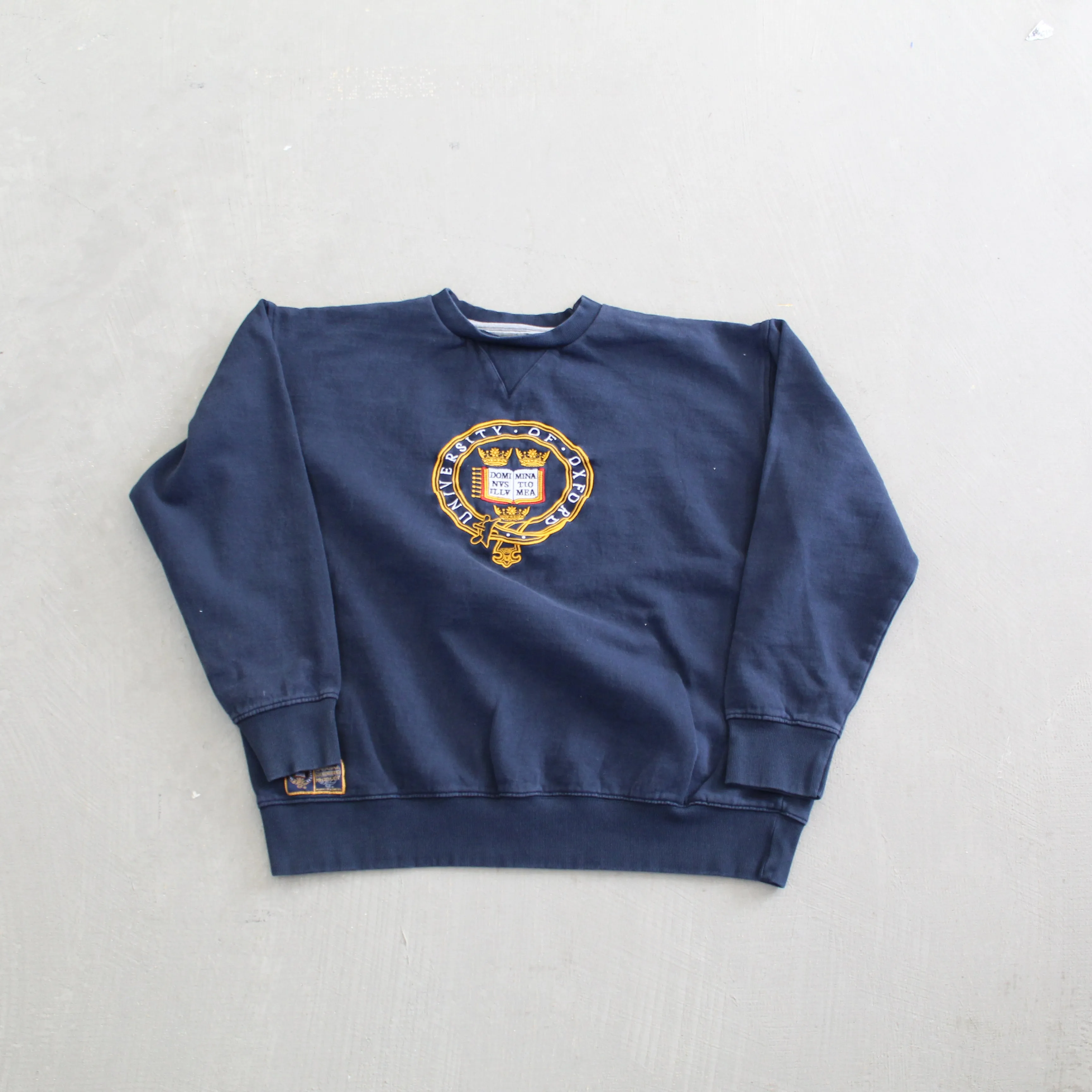 F- 2012 University Of Oxford Embroidered Text & Crest Crewneck sold by HG Vintage