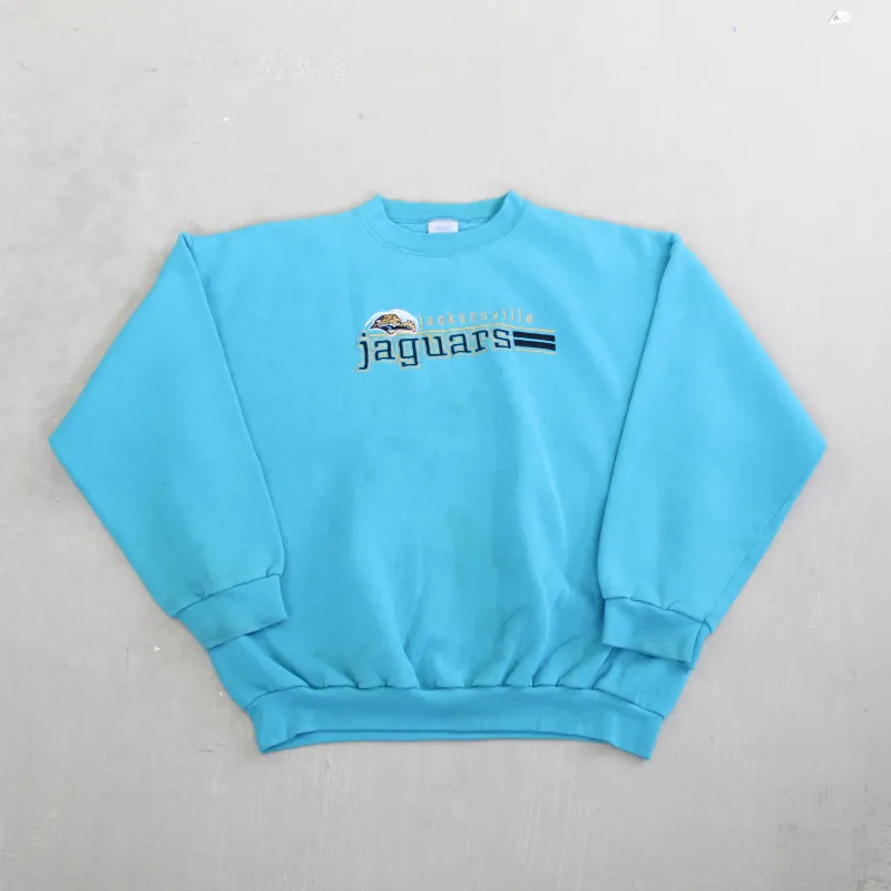 F- Vintage Jacksonville Jaguars NFL Logo 7 Embroidered Logo & Text Crewneck sold by HG Vintage