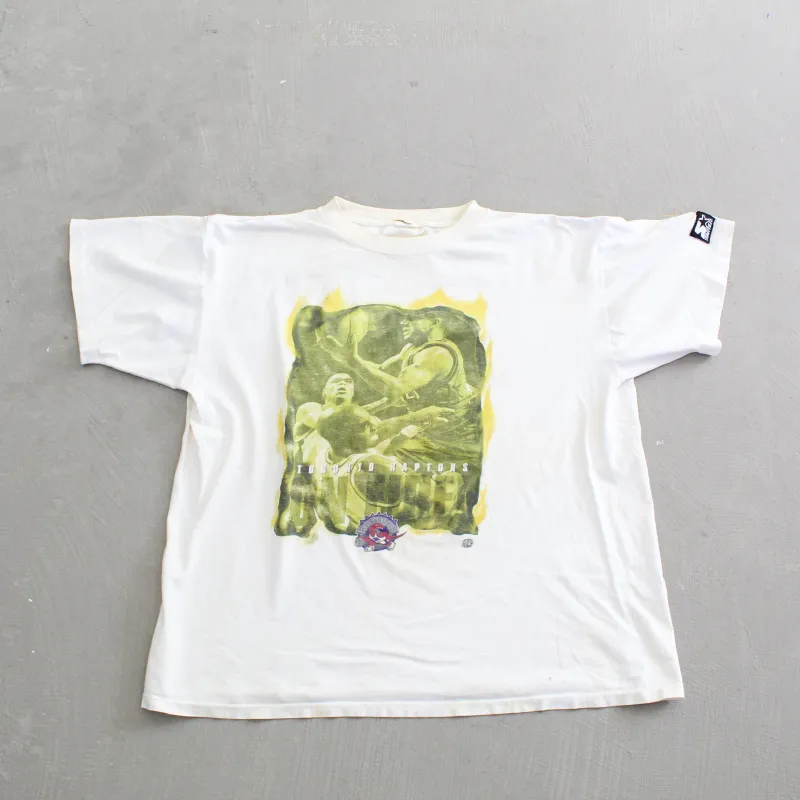 F- Vintage Toronto Raptors NBA Starter On Fire Picture Single Stitch Tee sold by HG Vintage