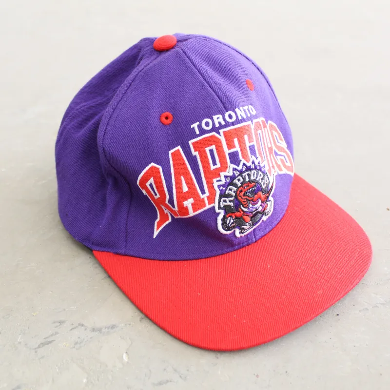 F- Vintage Toronto Raptors NBA Mitchell & Ness Old Logo & Text Snapback Hat sold by HG Vintage