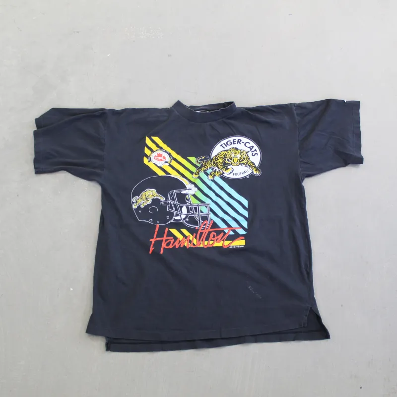 F- Vintage 1994 Hamilton Tiger-Cats CFL Graphic Single Stitch Tee sold by HG Vintage
