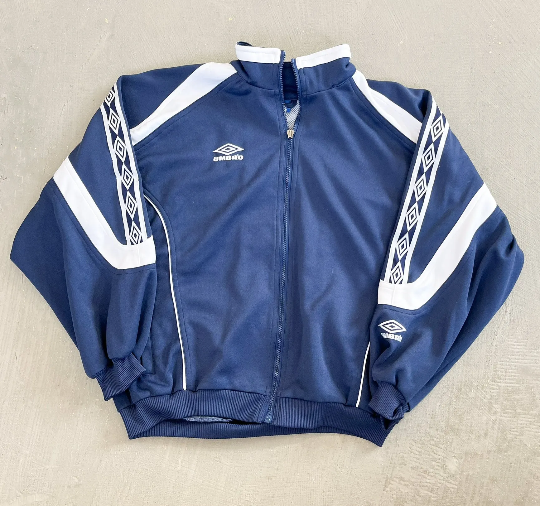 F- Vintage Umbro Embroidered Logo Zip Up Track Jacket sold by HG Vintage