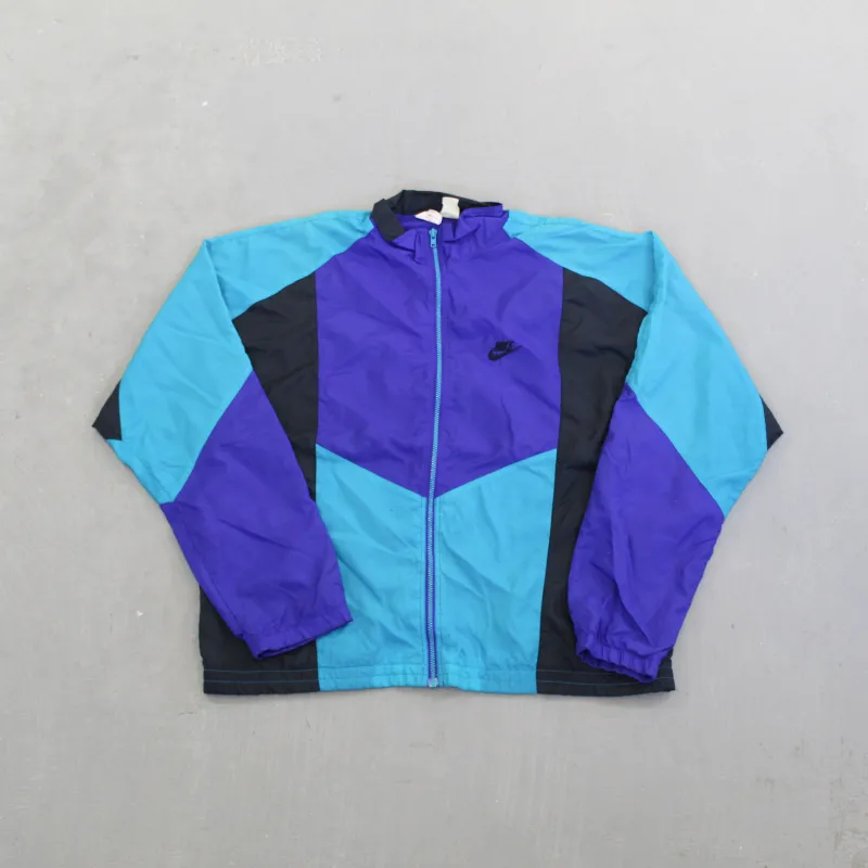F- Vintage Nike Purple/Teal Zip Up Nylon Windbreaker Jacket made by HG Vintage