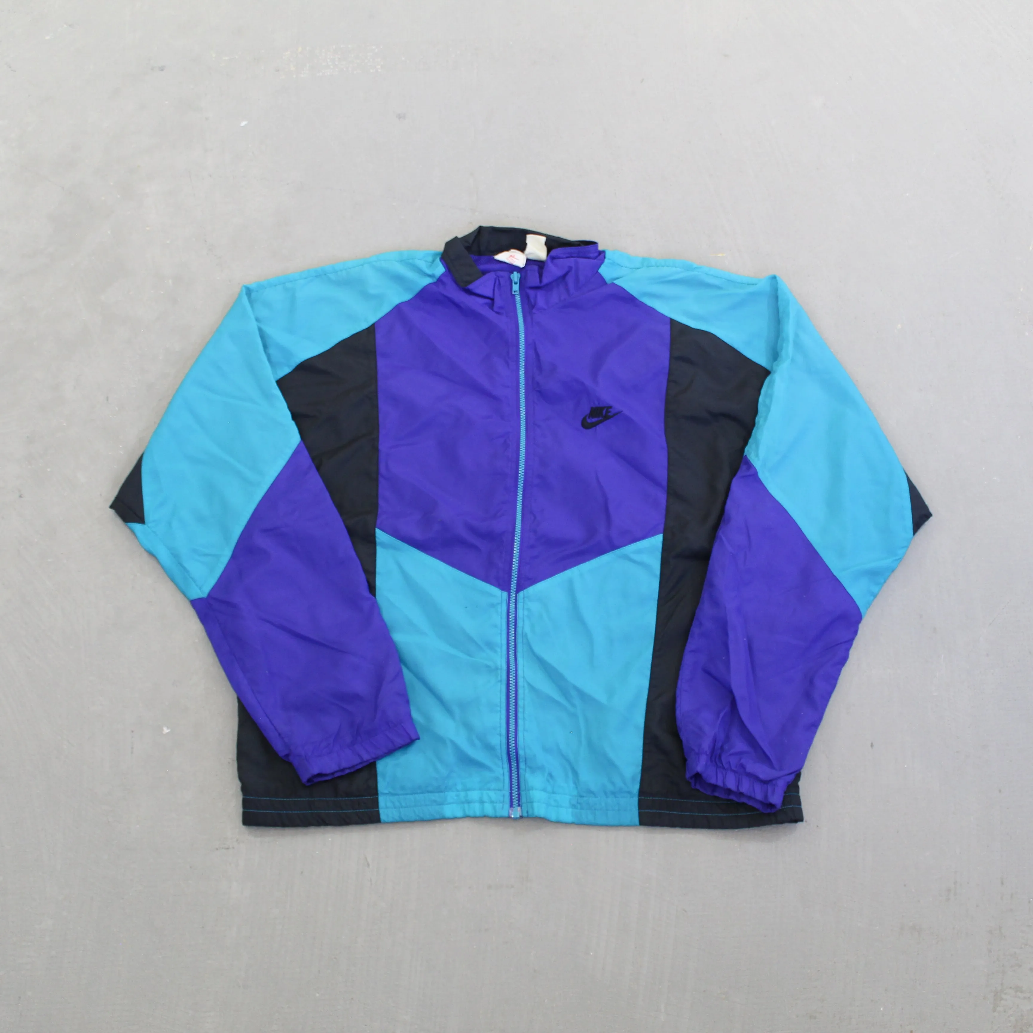 F- Vintage Nike Purple/Teal Zip Up Nylon Windbreaker Jacket sold by HG Vintage