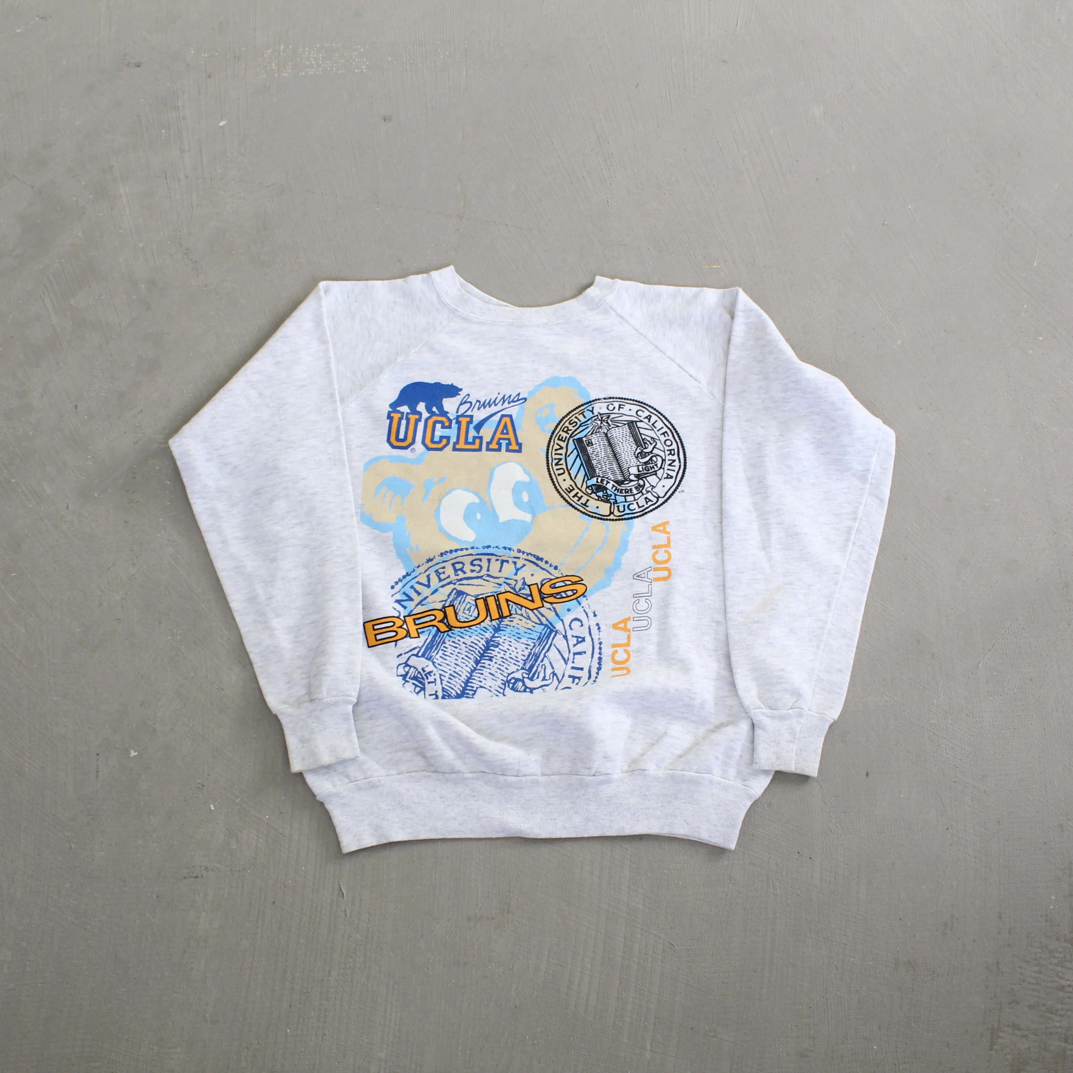 F- Vintage 89' UCLA Bruins Mascot Seal & Text Crewneck sold by HG Vintage
