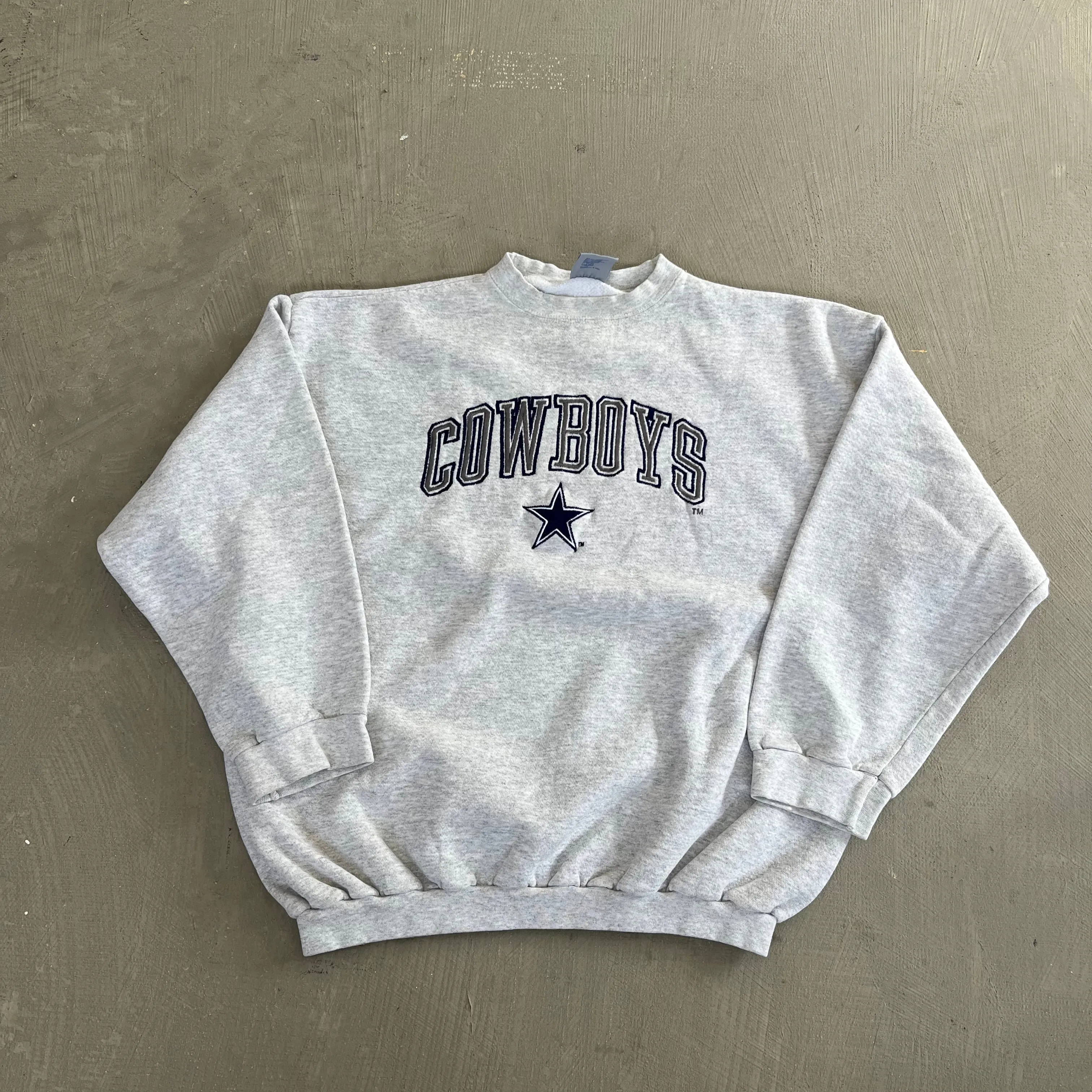 F- Vintage Dallas Cowboys NFL Logo 7 Embroidered Text & Logo Crewneck sold by HG Vintage