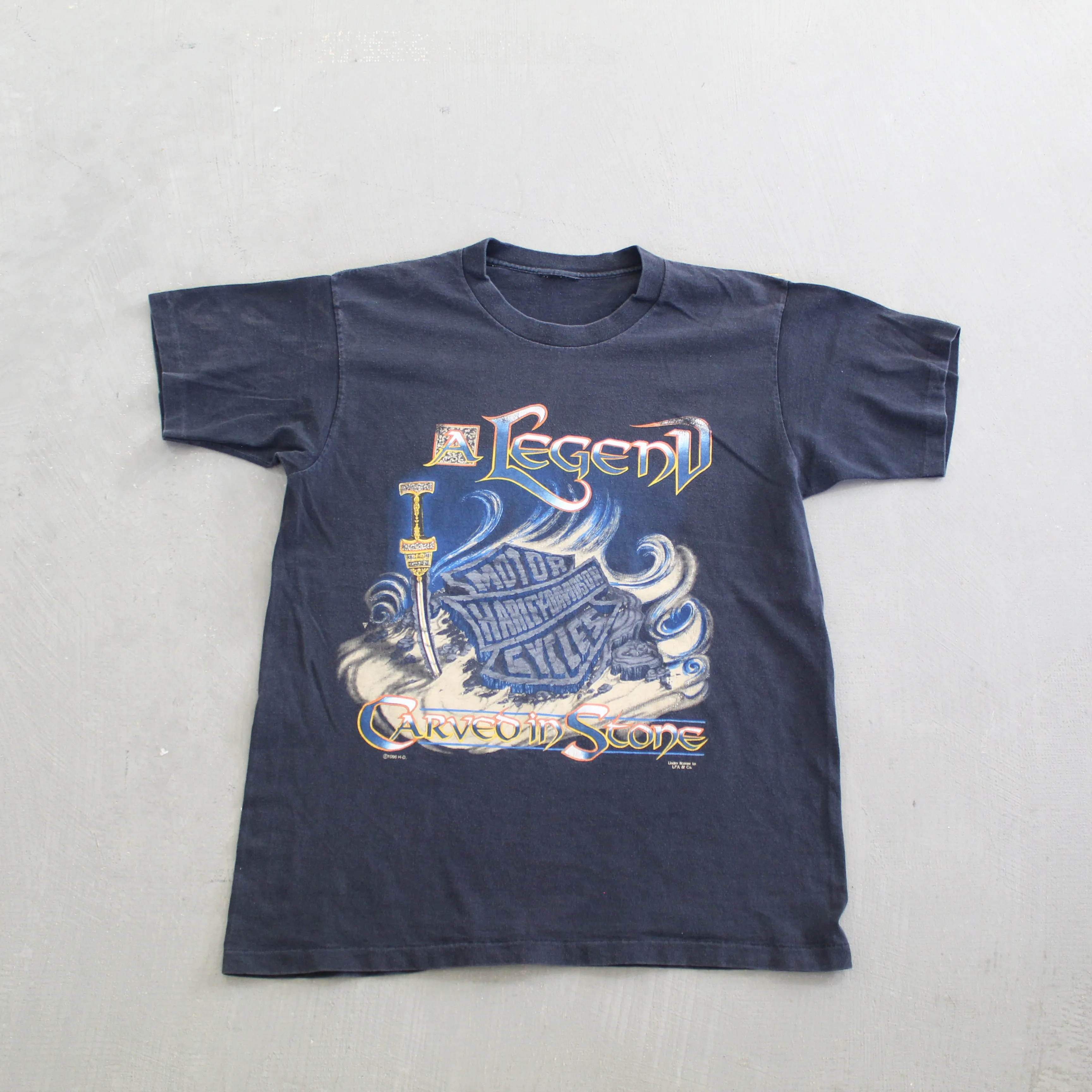 F- Vintage 1996 Harley Davidson A Legend Carved Stone Single Stitch Tee sold by HG Vintage