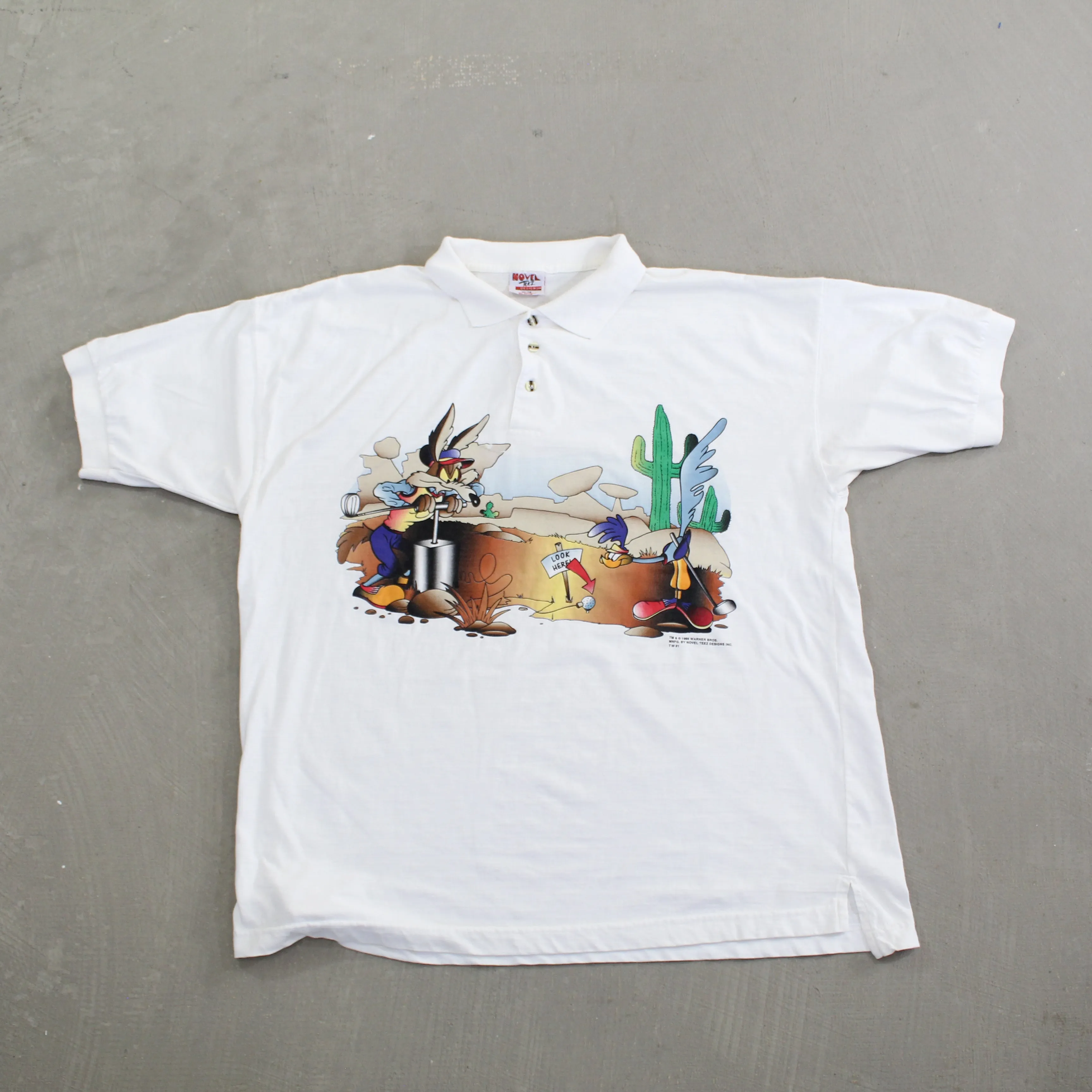 F- Vintage 1995 Looney Tunes Wile E. Coyote & Road Runner Henley Polo Tee sold by HG Vintage