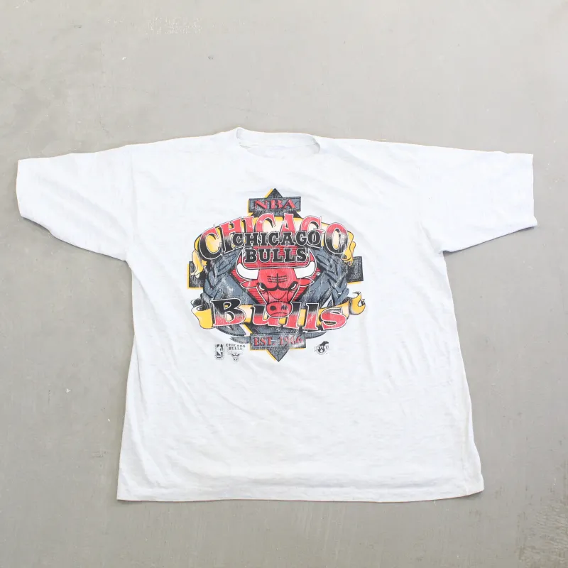 F- Vintage 90s Chicago Bulls NBA Raven Athletic Logo & Text Single Stitch Tee sold by HG Vintage