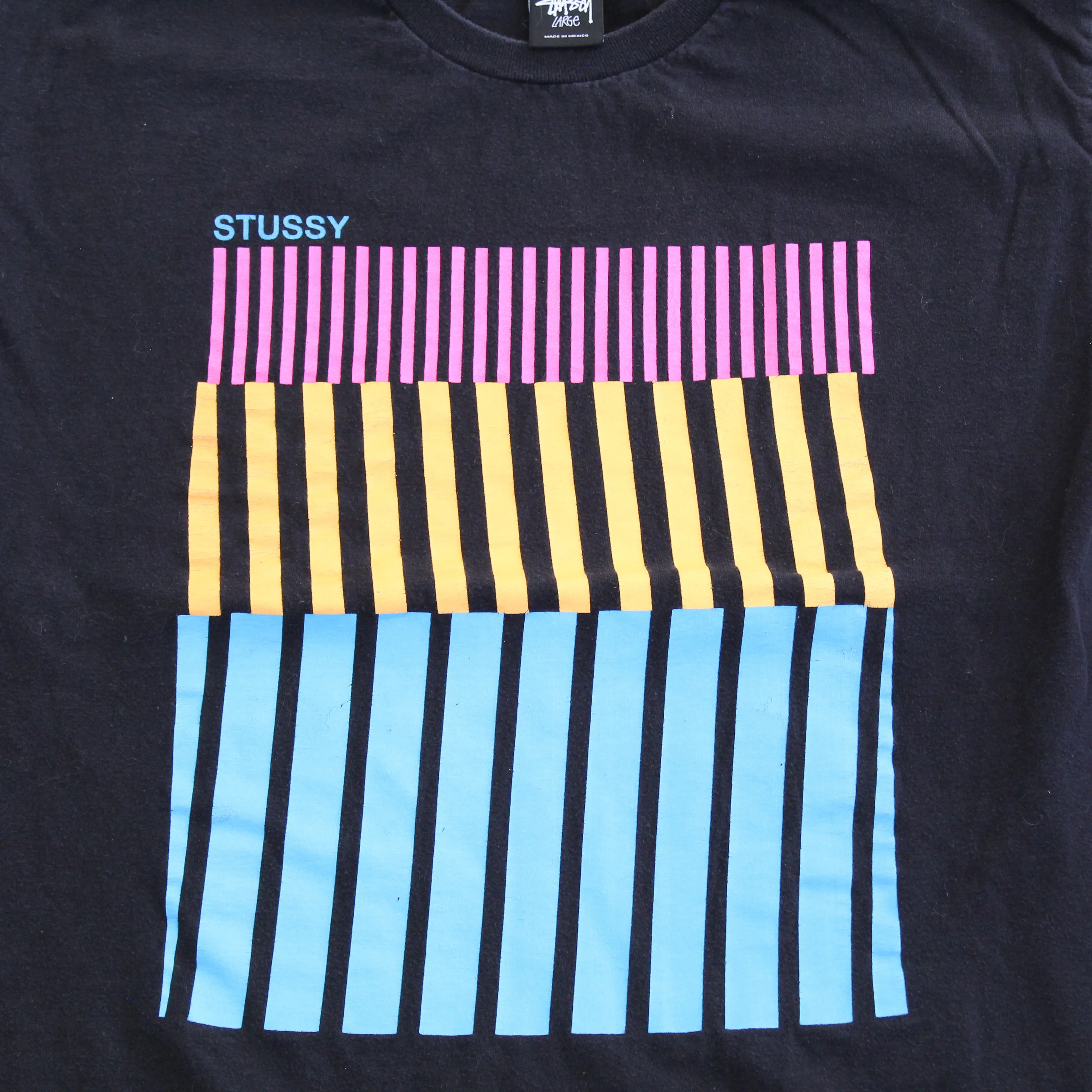 F- Stussy Text & Colored Lines Graphic Tee sold by HG Vintage product image thumbnail 2