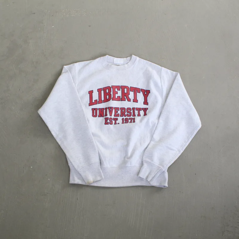 F- Vintage Champion Reverse Weave Liberty University Text Crewneck sold by HG Vintage