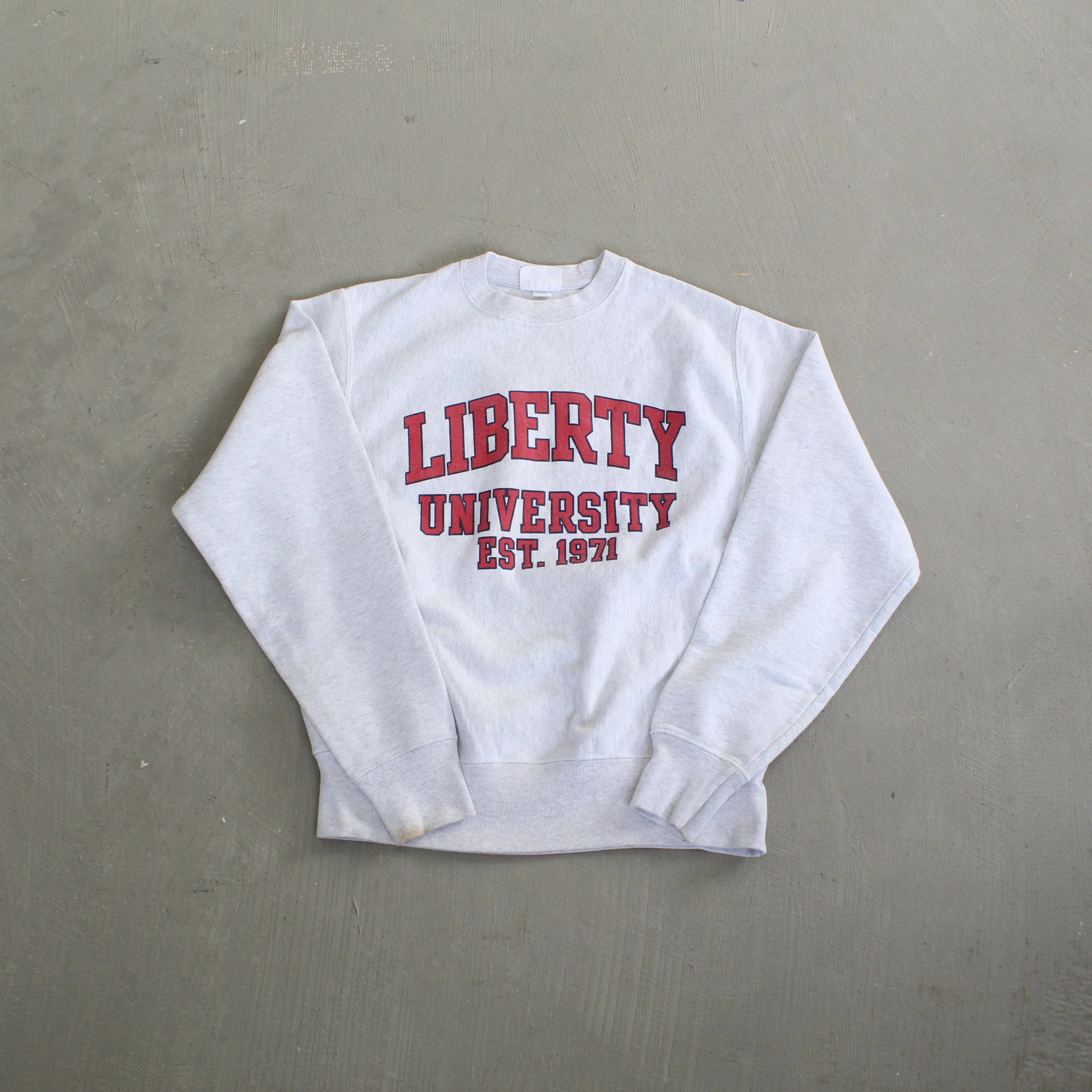 F- Vintage Champion Reverse Weave Liberty University Text Crewneck sold by HG Vintage