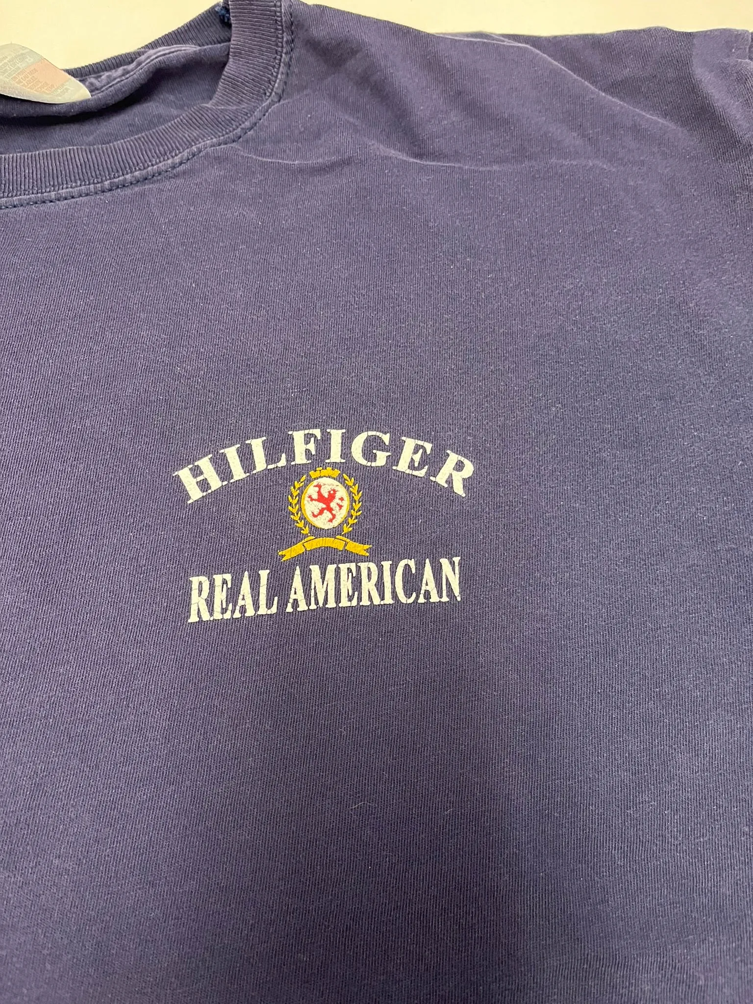 F- Vintage Tommy Hilfiger Real American Text Tee sold by HG Vintage product image thumbnail 2