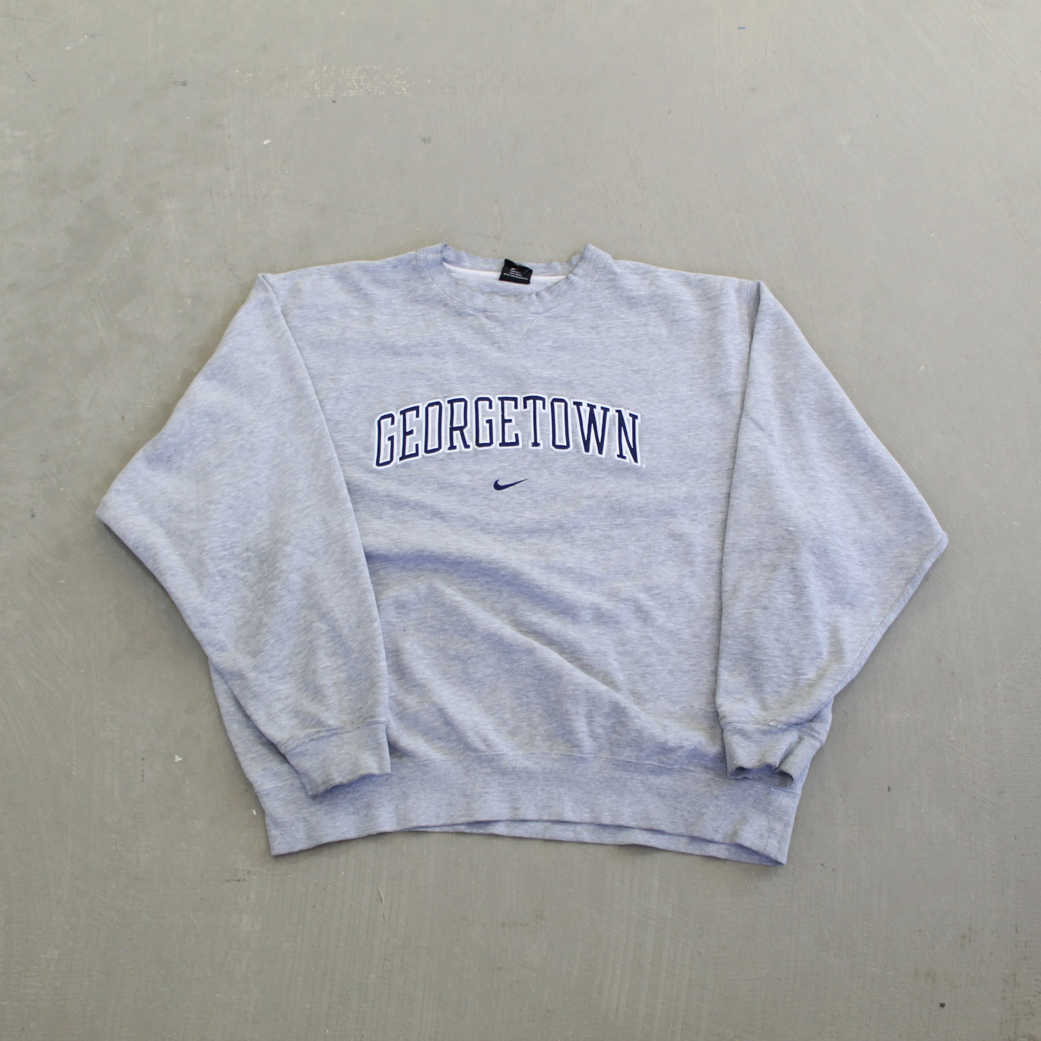 F- Vintage Nike Team George Town Embroidered Text Crewneck sold by HG Vintage