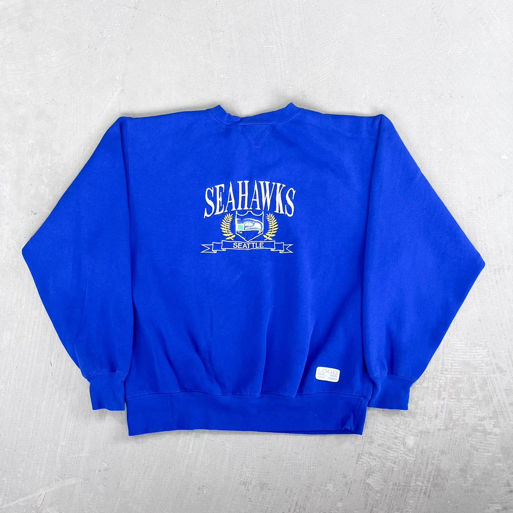 F- Vintage Seattle Seahawks NFL Logo 7 Embroidered Text & Logo Crewneck sold by HG Vintage