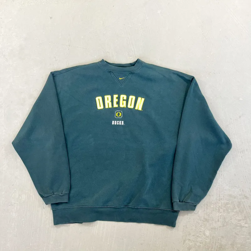 F- Vintage Oregon Ducks Nike Team Embroidered Text Crewneck sold by HG Vintage