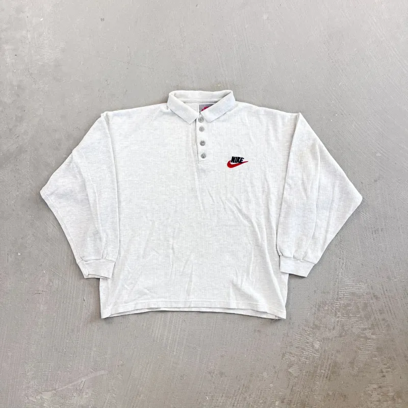 F- Vintage Nike Embroidered Text Long Sleeve Rugby Shirt sold by HG Vintage