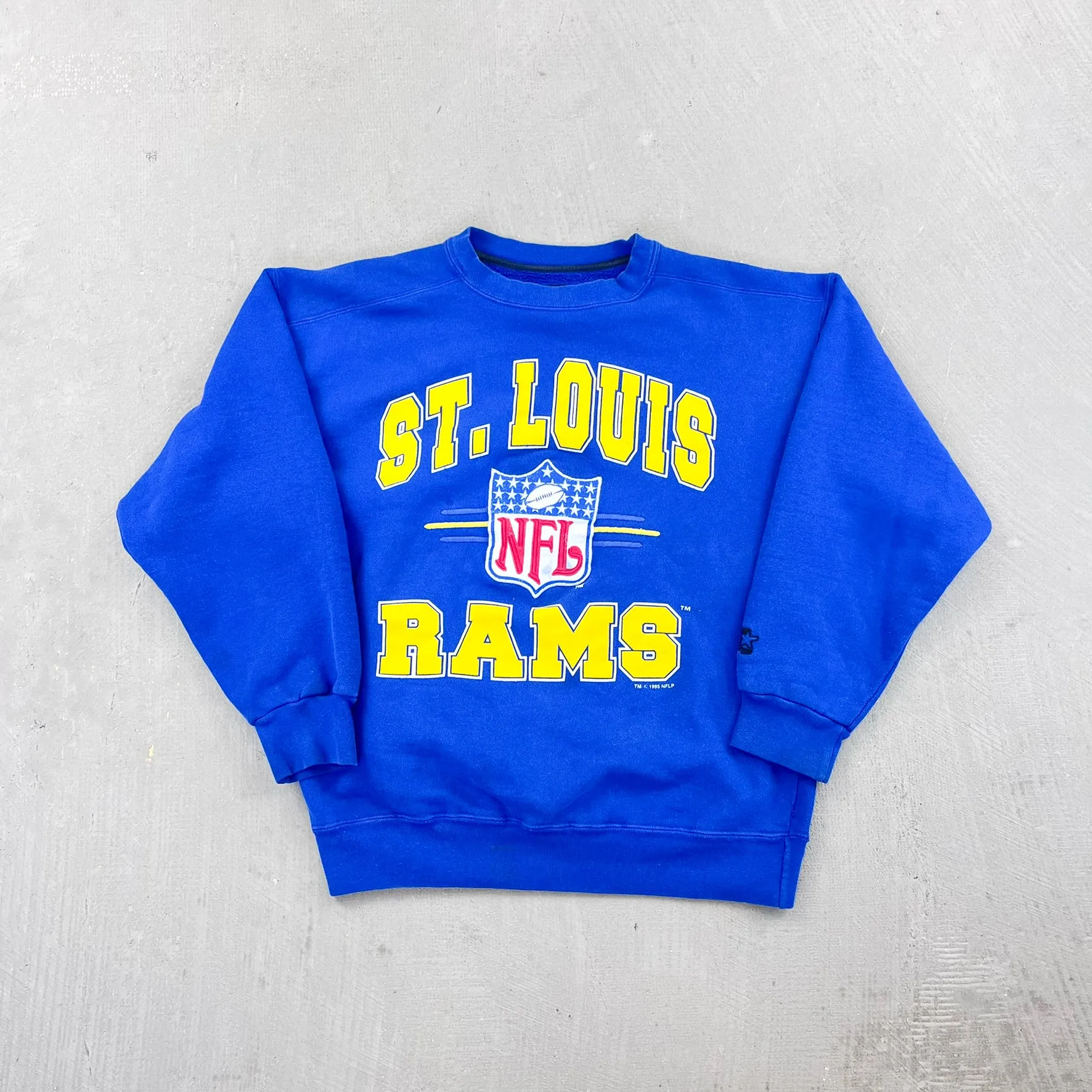 F- Vintage '95 St Louis Rams NFL Starter Embroidered Text Crewneck sold by HG Vintage