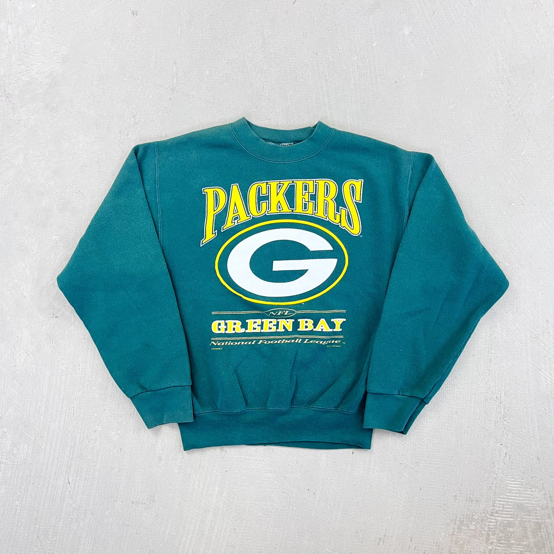 F- Vintage '97 Green Bay Packers NFL Lee Text Crewneck sold by HG Vintage