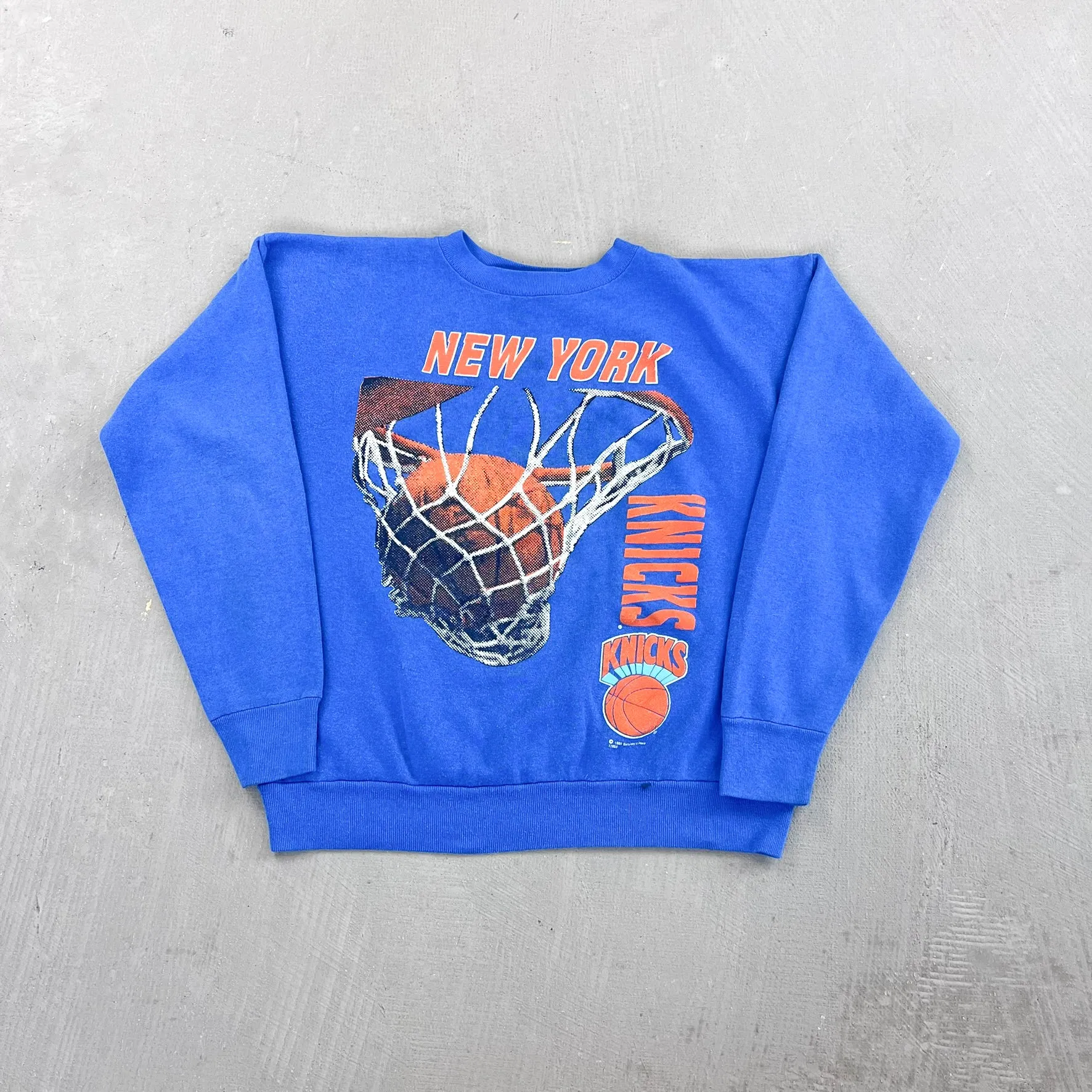 F- Vintage '91 New York Knicks NBA Text & Graphic Crewneck sold by HG Vintage