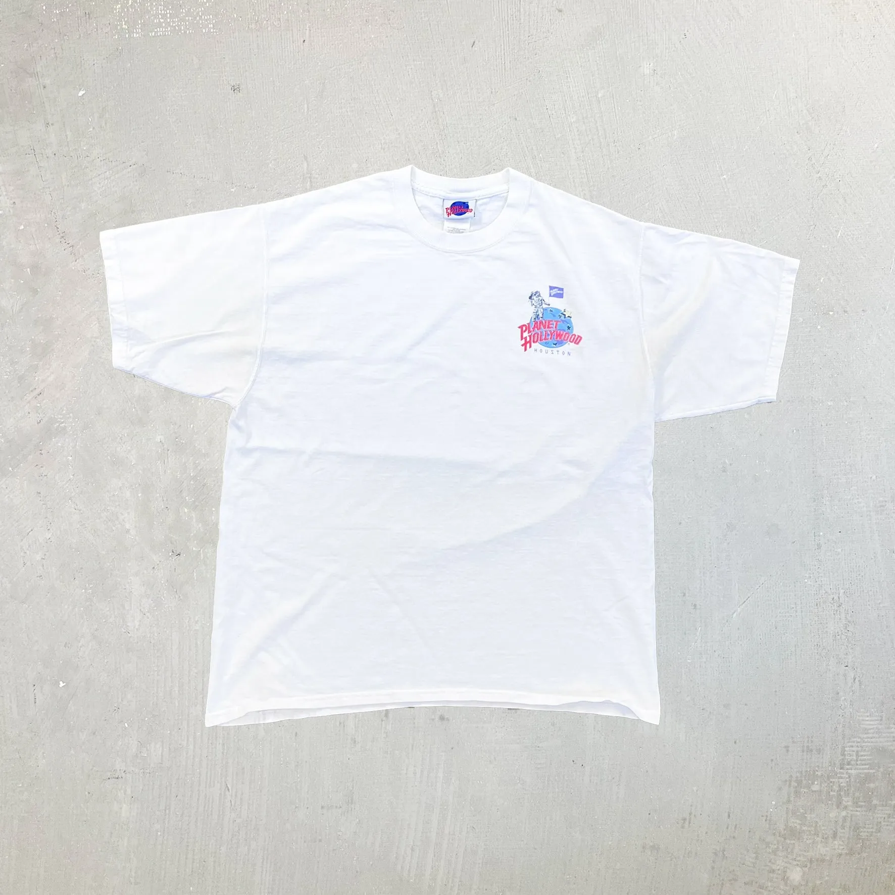 F- Vintage '91 Planet Hollywood Houston Texas Graphic Tee sold by HG Vintage