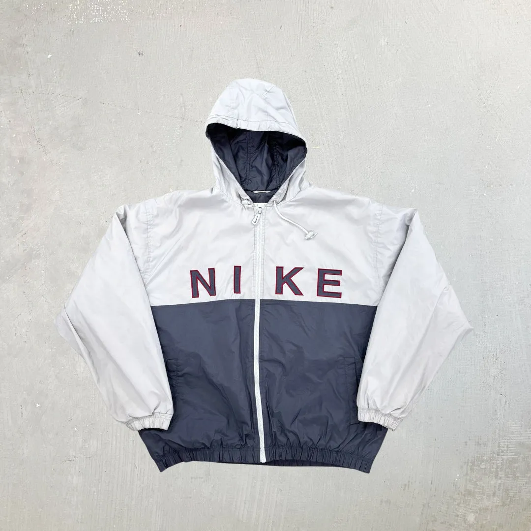 F- Vintage 90s Nike Embroidered Text Zip Up Winter Jacket sold by HG Vintage