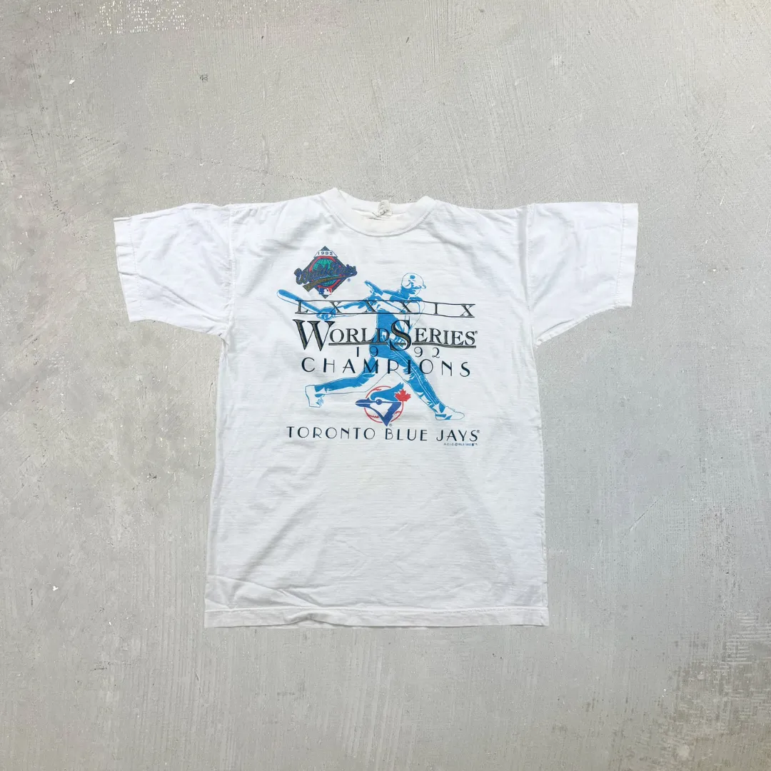F- Vintage '92 Toronto Blue Jays World Series MLB Champions Text & Batter Single Stitch Tee sold by HG Vintage
