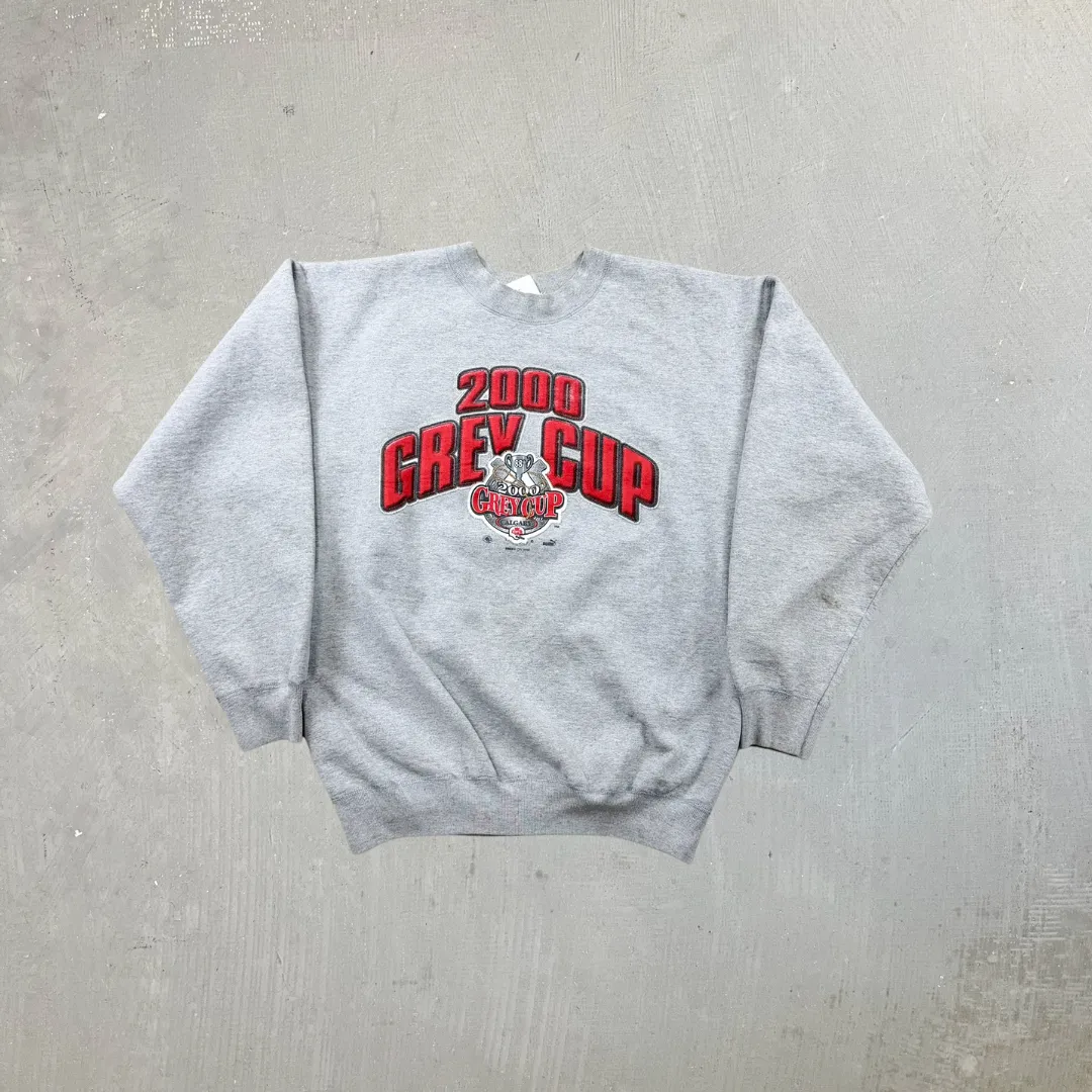 F- Vintage '00 CFL Calgary Grey Cup Puma Graphic Crewneck sold by HG Vintage